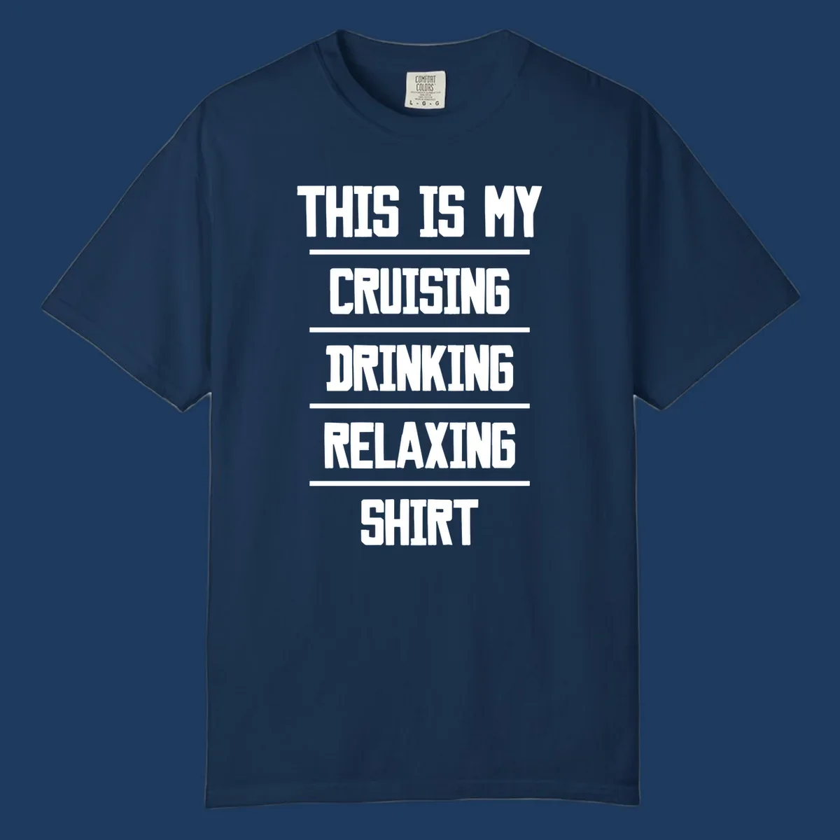 White stacked text on gray background reading 'This Is My Cruising Drinking Relaxing Shirt' with horizontal line dividers