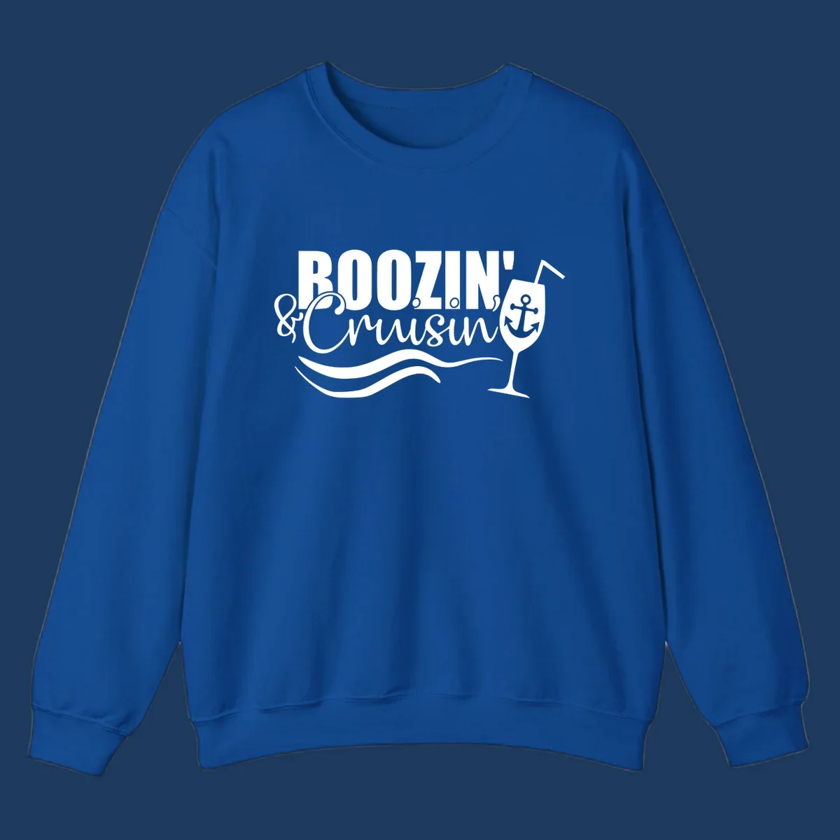 Boozin' and Cruising design with cocktail glass, anchor, and nautical waves in white on gray background