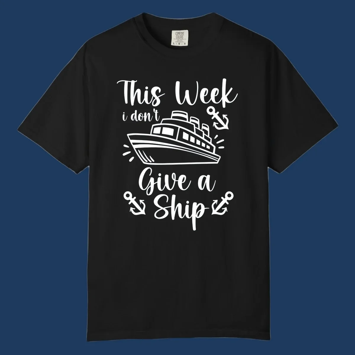Gray and white nautical design with cruise ship and anchors, text reads 'This Week i don't Give a Ship' - don't give a ship cruise pun tee
