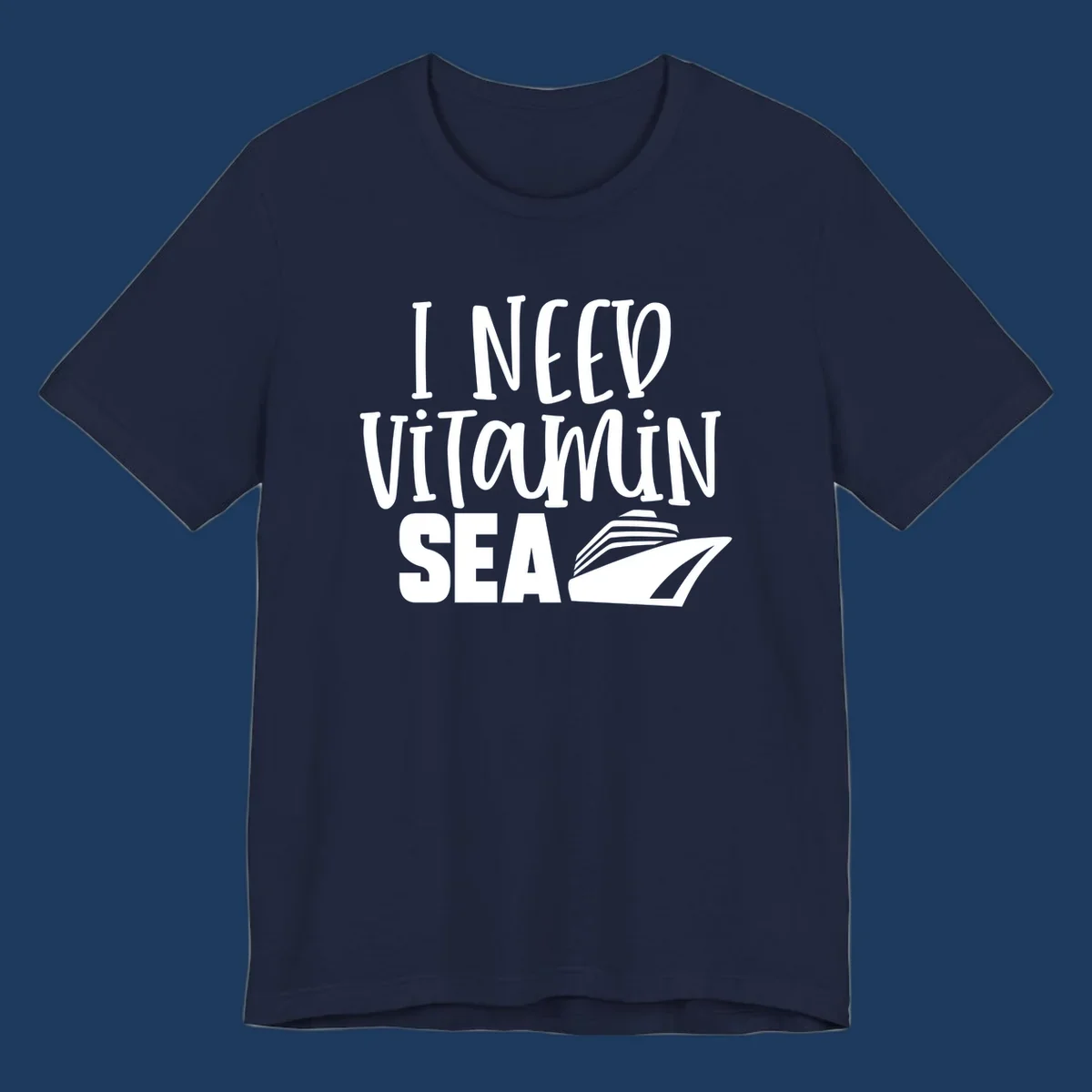 White text reading 'I NEED VITAMIN SEA' with a cruise ship illustration on gray background