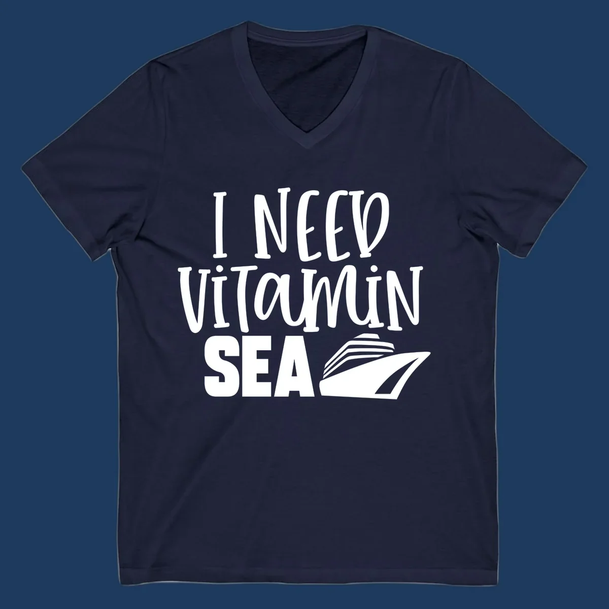White text reading 'I NEED VITAMIN SEA' with a cruise ship illustration on gray background