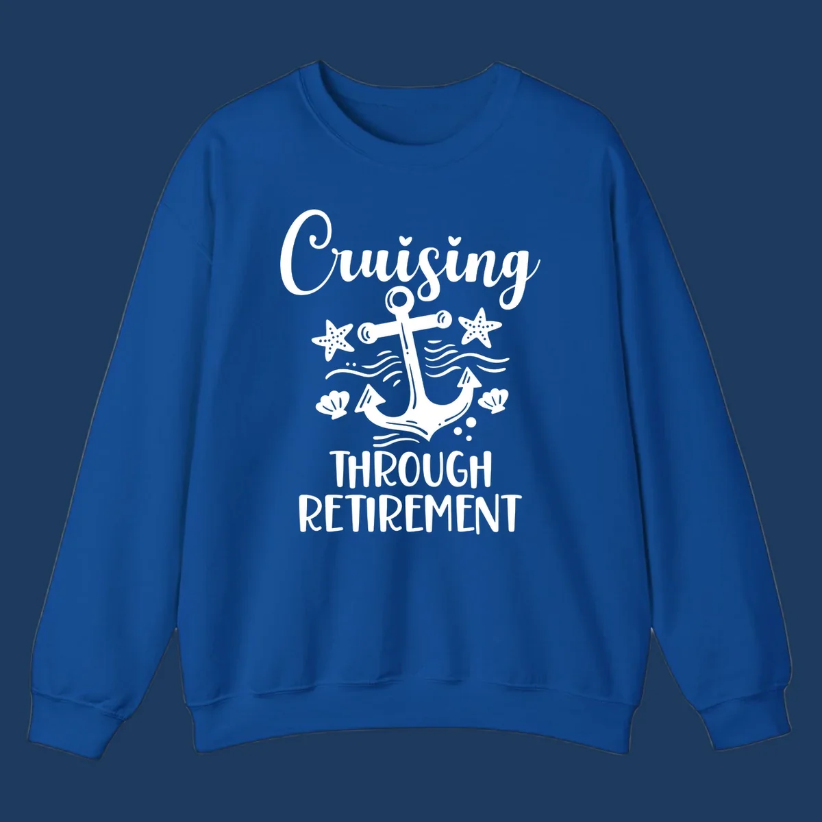 Cruising through retirement nautical design with white anchor, starfish, seashells, and ocean waves on gray background