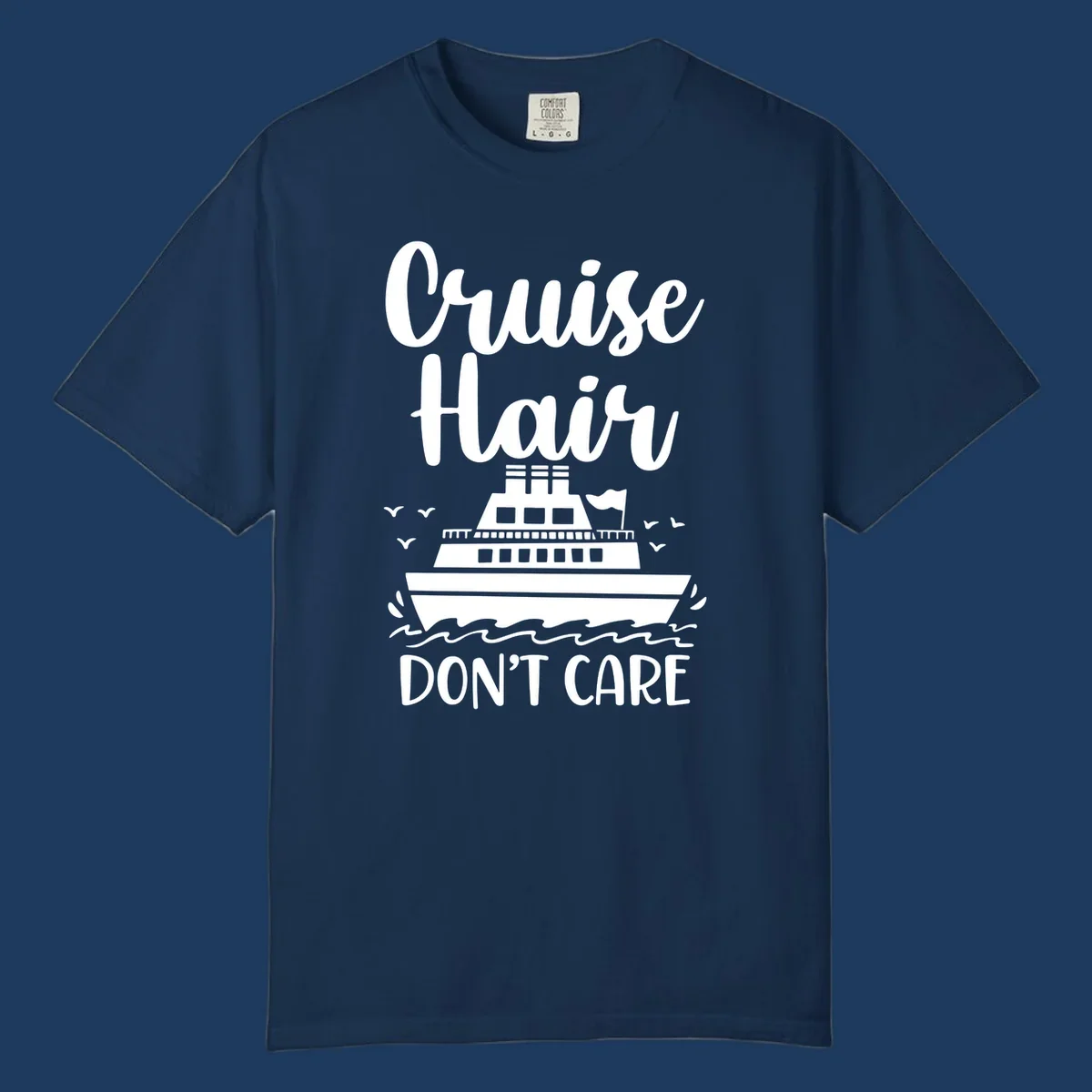 Cruise hair don't care design featuring a white cruise ship on ocean waves with seagulls, playful vacation lettering on gray background