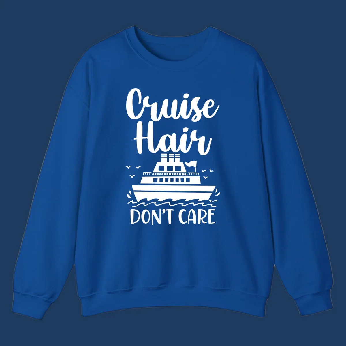 Cruise hair don't care design featuring a white cruise ship on ocean waves with seagulls, playful vacation lettering on gray background