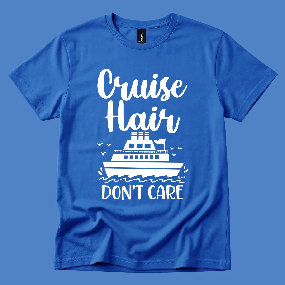 Cruise hair don't care design featuring a white cruise ship on ocean waves with seagulls, playful vacation lettering on gray background