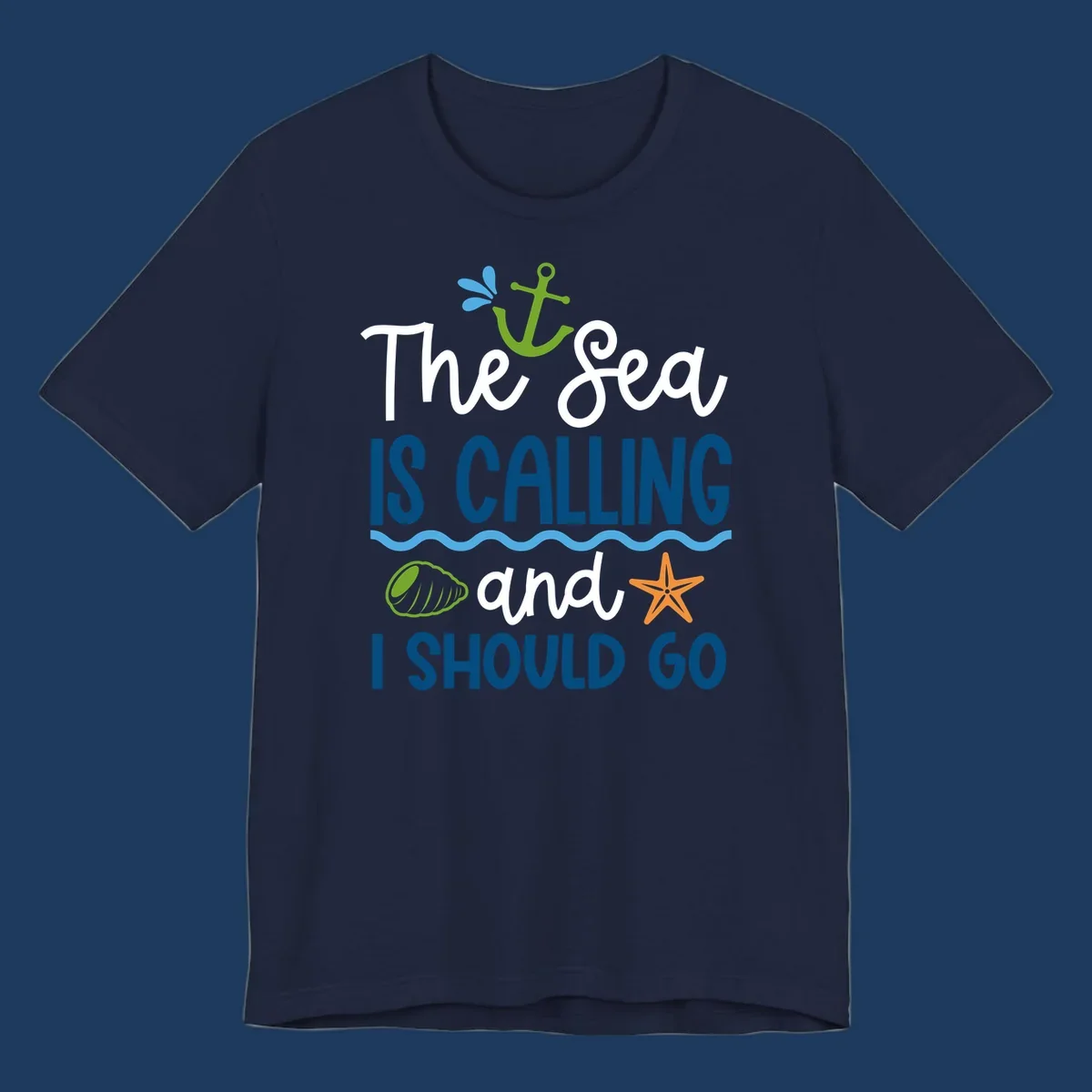 Gray tee design with 'The Sea Is Calling and I Should Go' text in white and blue, decorated with nautical icons including anchor, starfish, seashell, and ocean waves.