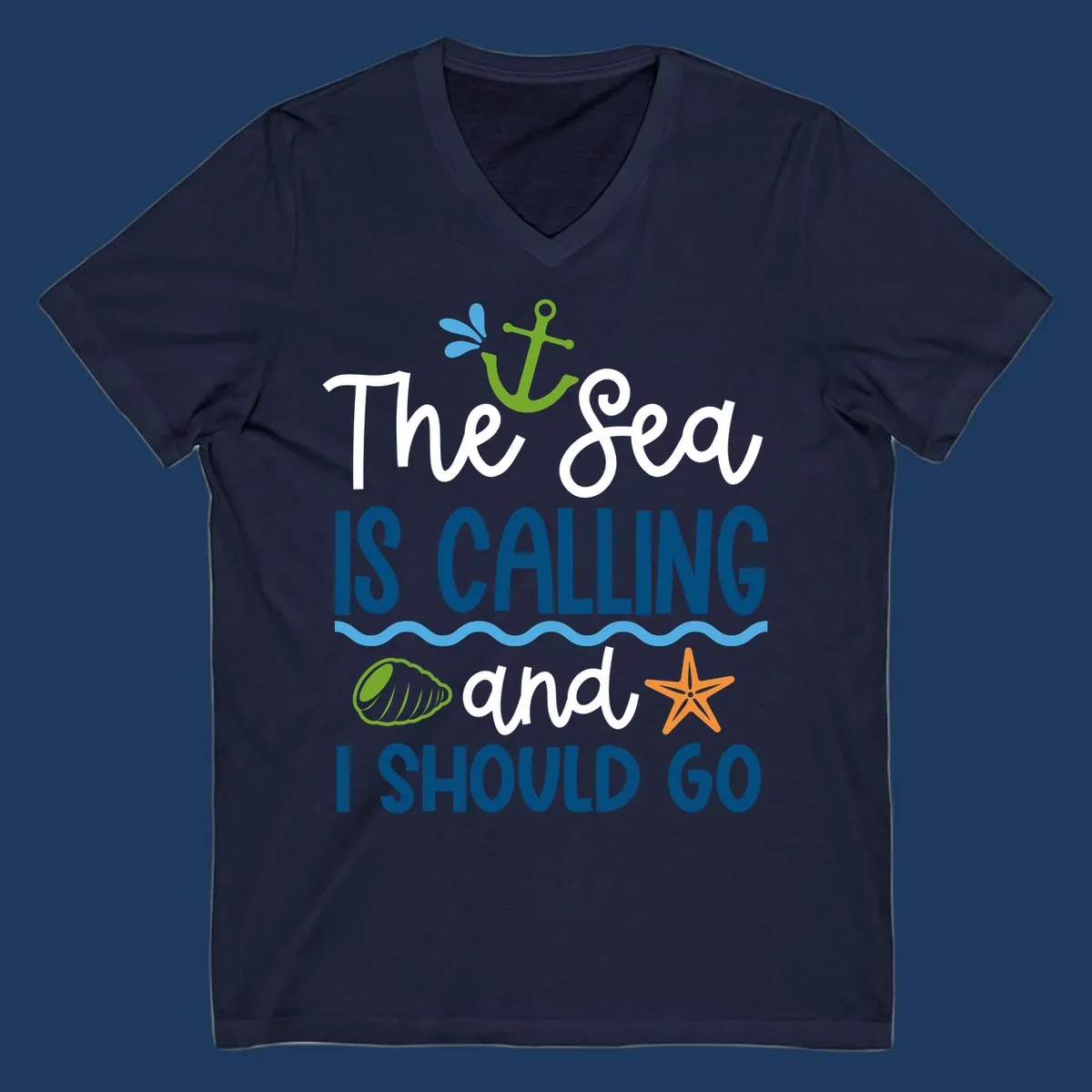Gray tee design with 'The Sea Is Calling and I Should Go' text in white and blue, decorated with nautical icons including anchor, starfish, seashell, and ocean waves.