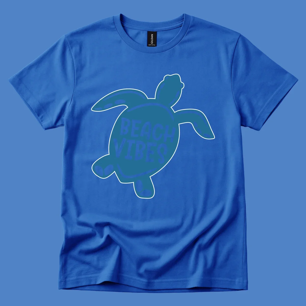 Teal sea turtle illustration with spotted shell pattern and 'Beach Vibes' text centered on the shell