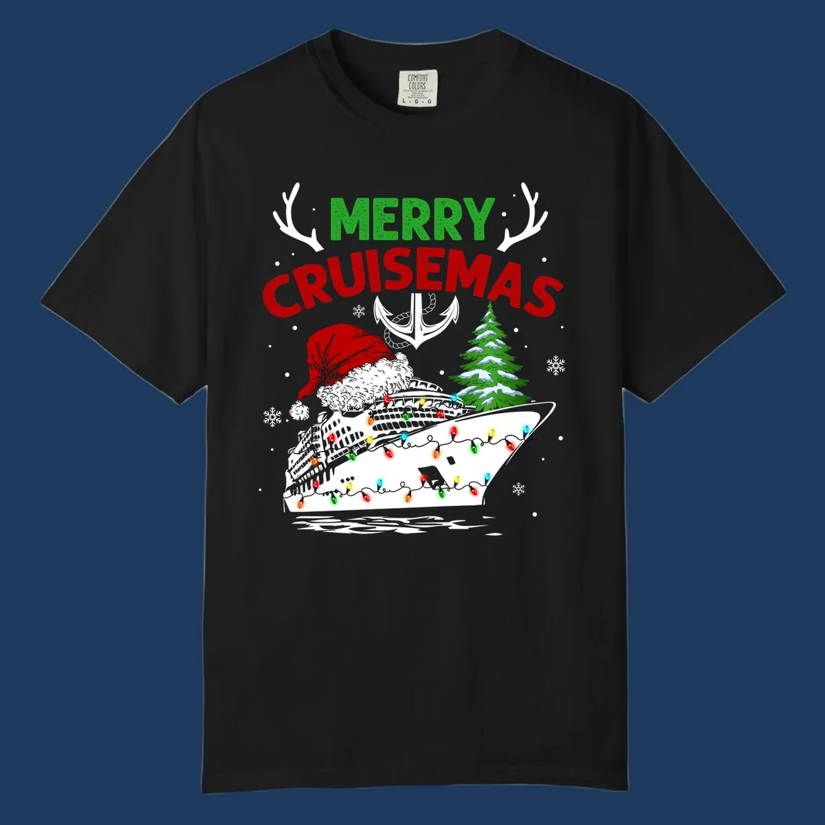Merry Cruisemas design featuring a decorated cruise ship with Santa hat, Christmas lights, evergreen tree, and nautical elements on gray background