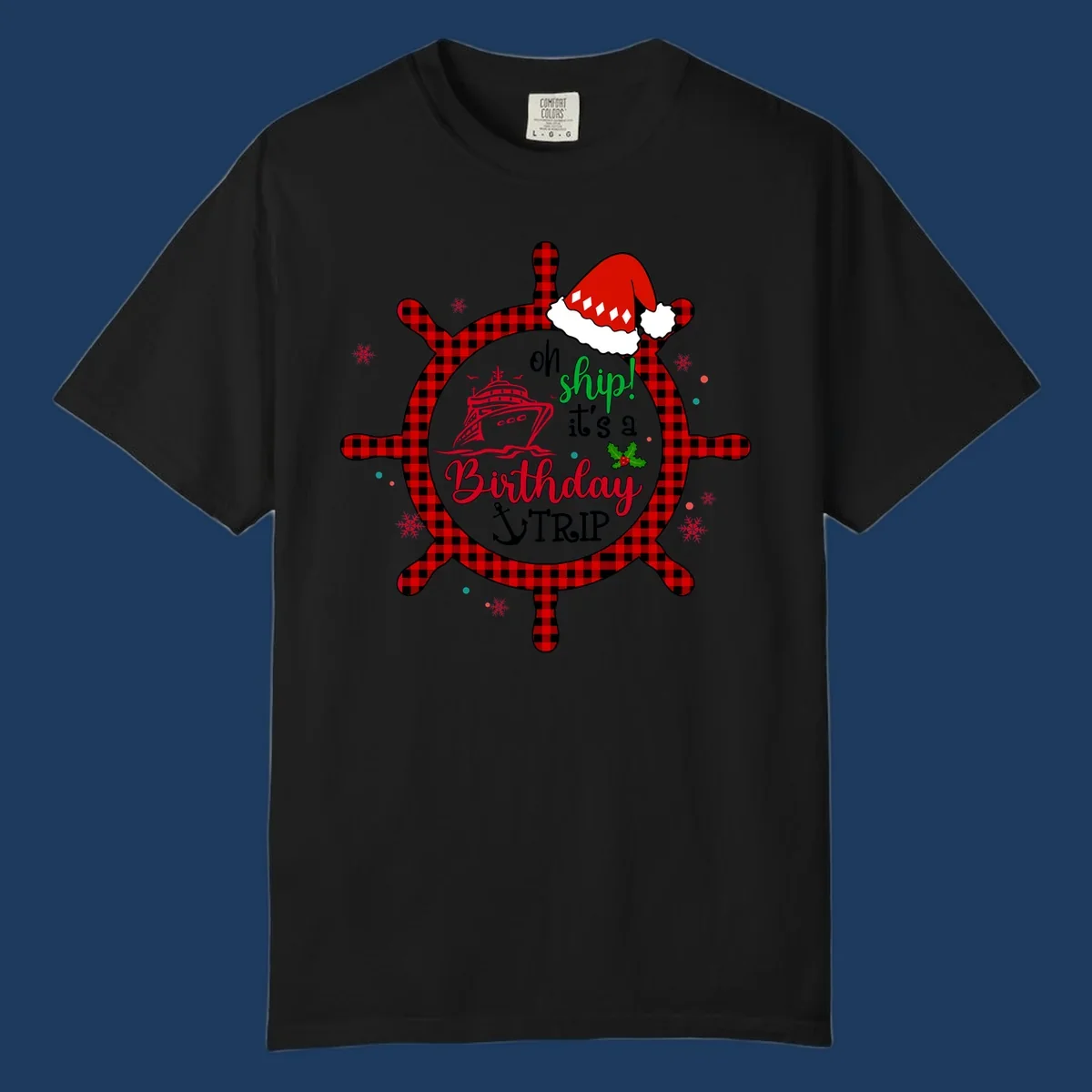 Oh ship birthday cruise design with plaid ship wheel, cruise ship illustration, Santa hat, and holly leaves on gray background