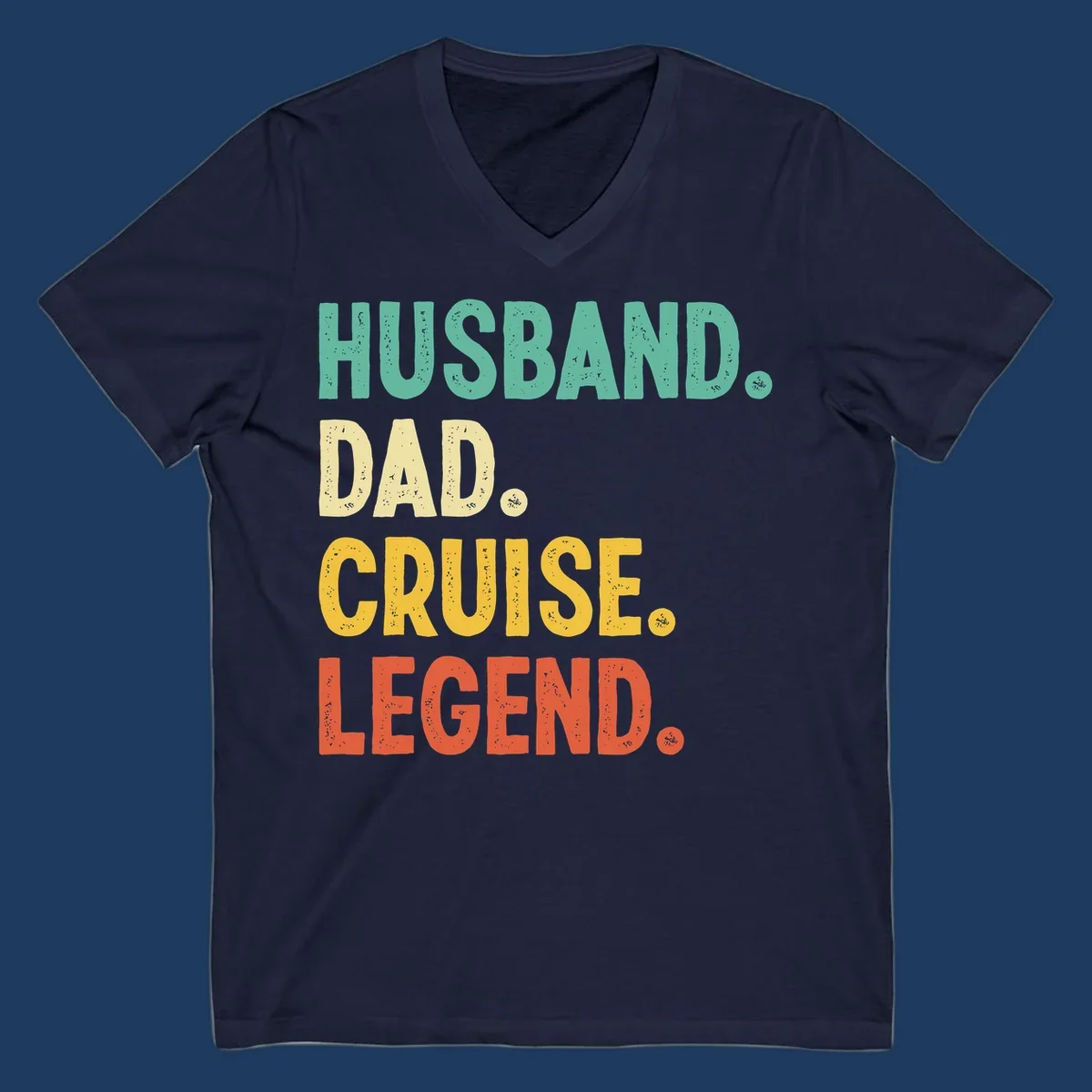 Colorful stacked text reading 'Husband. Dad. Cruise. Legend.' in mint, yellow, and coral with distressed texture on gray background