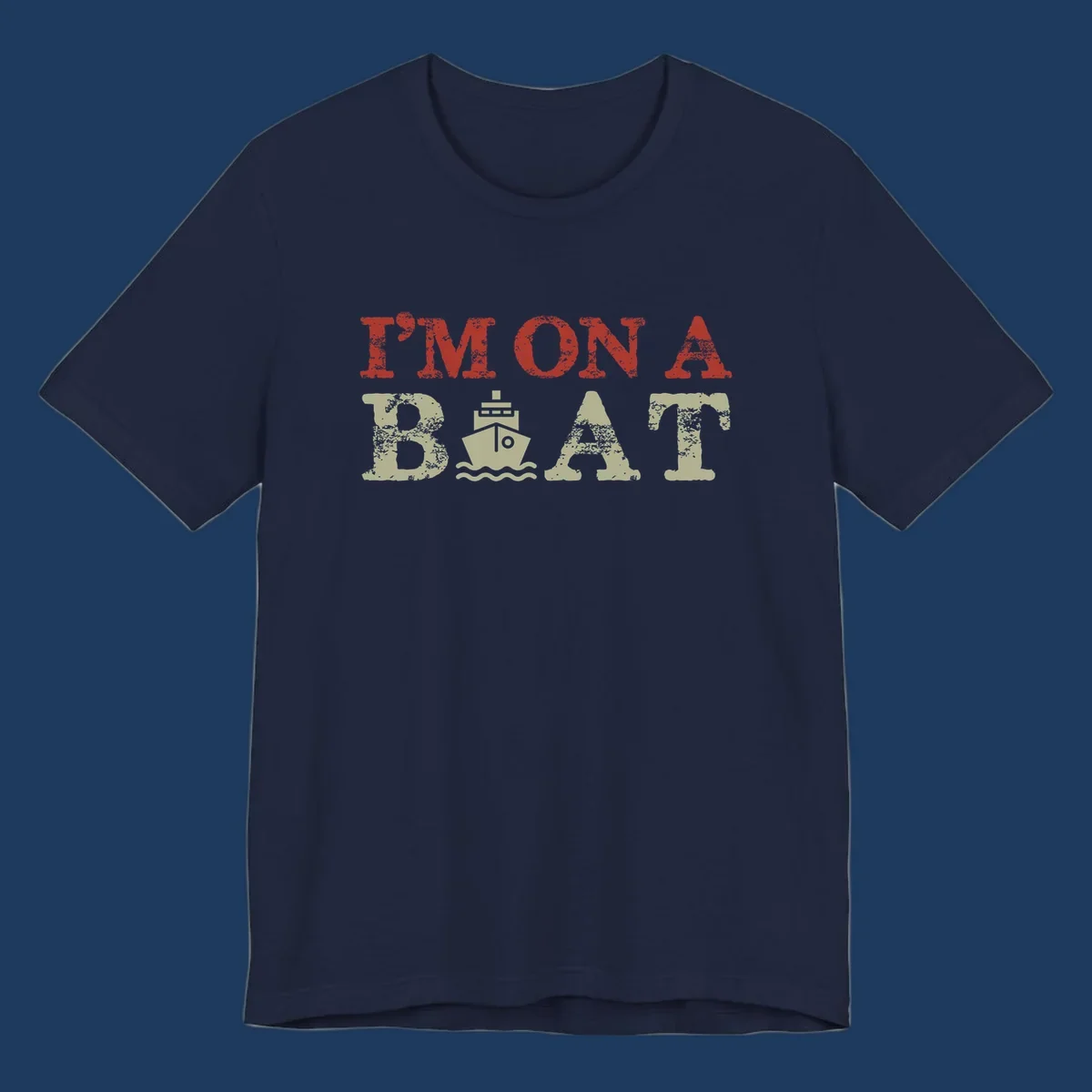 Red and cream distressed design featuring 'I'm On A Boat' text with ship and wave icons for cruise vacation apparel