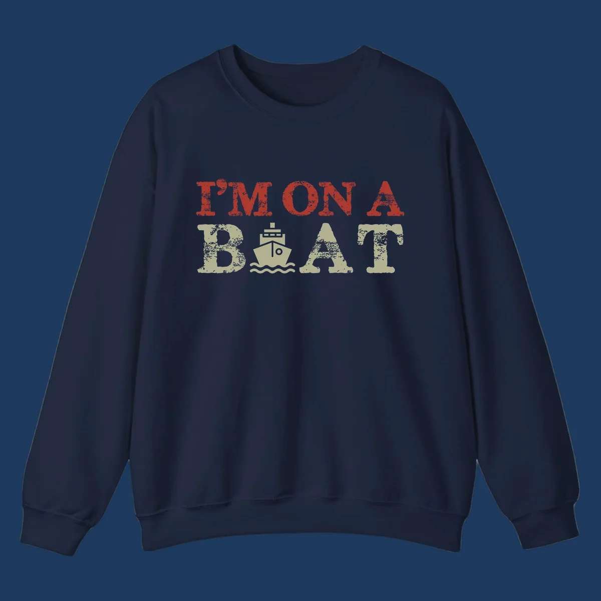 Red and cream distressed design featuring 'I'm On A Boat' text with ship and wave icons for cruise vacation apparel
