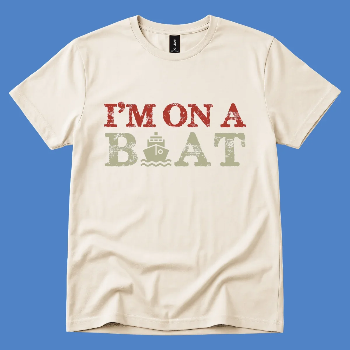 Red and cream distressed design featuring 'I'm On A Boat' text with ship and wave icons for cruise vacation apparel
