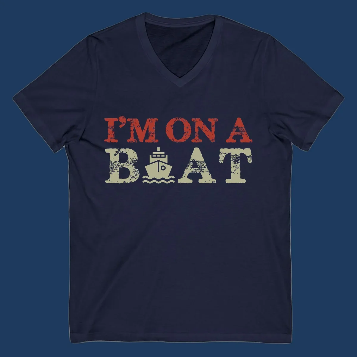 Red and cream distressed design featuring 'I'm On A Boat' text with ship and wave icons for cruise vacation apparel