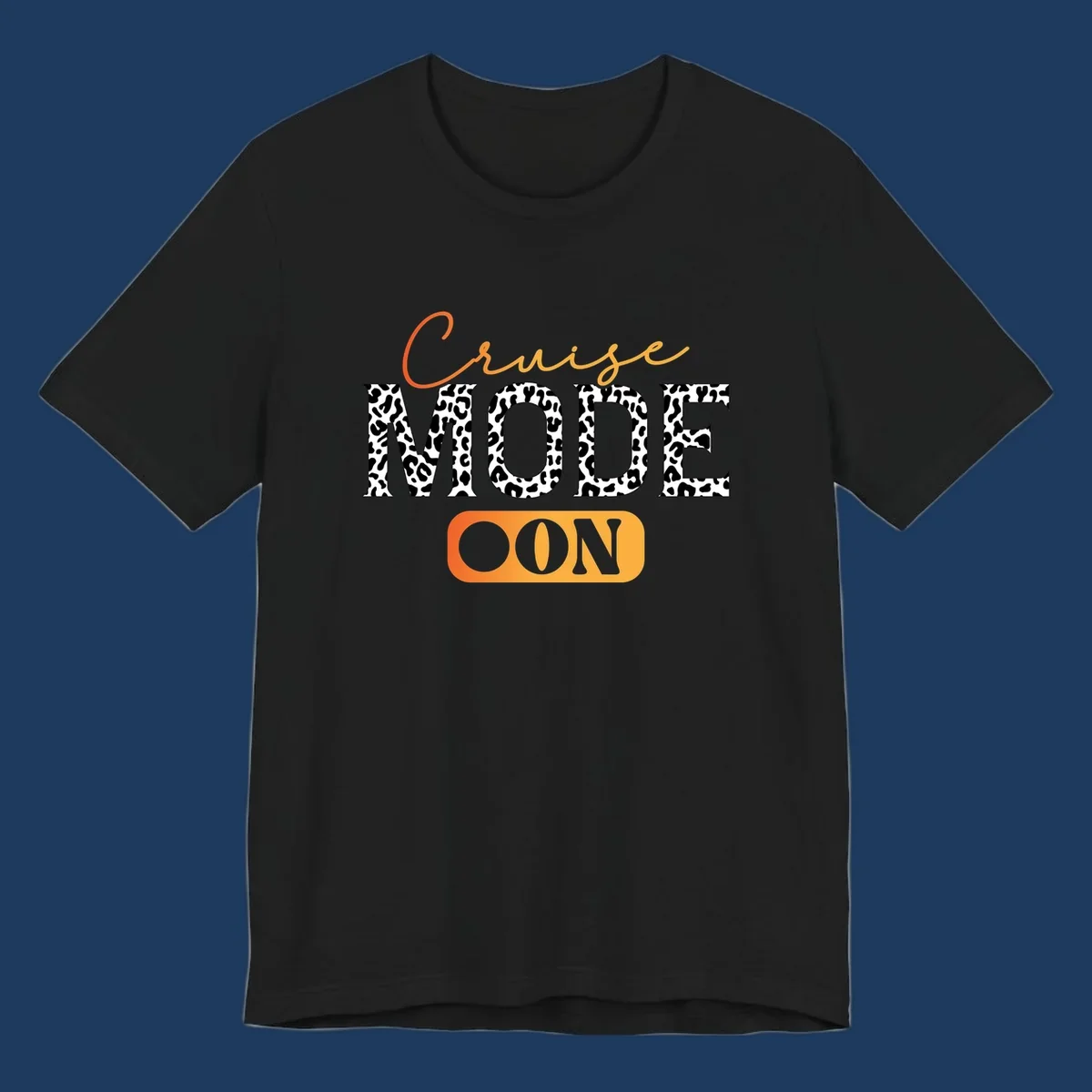 Cruise mode on design with orange cursive text and leopard print letters on gray background