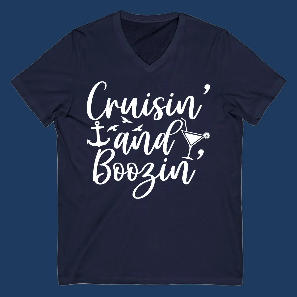 Cruisin and boozing nautical design with anchor, seagulls, and cocktail illustration on gray background