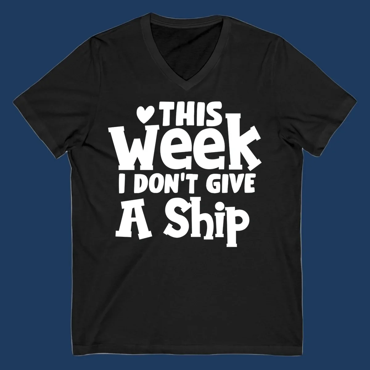 Bold white text reading 'Love This Week I Don't Give A Ship' with heart and arrow symbols on gray background