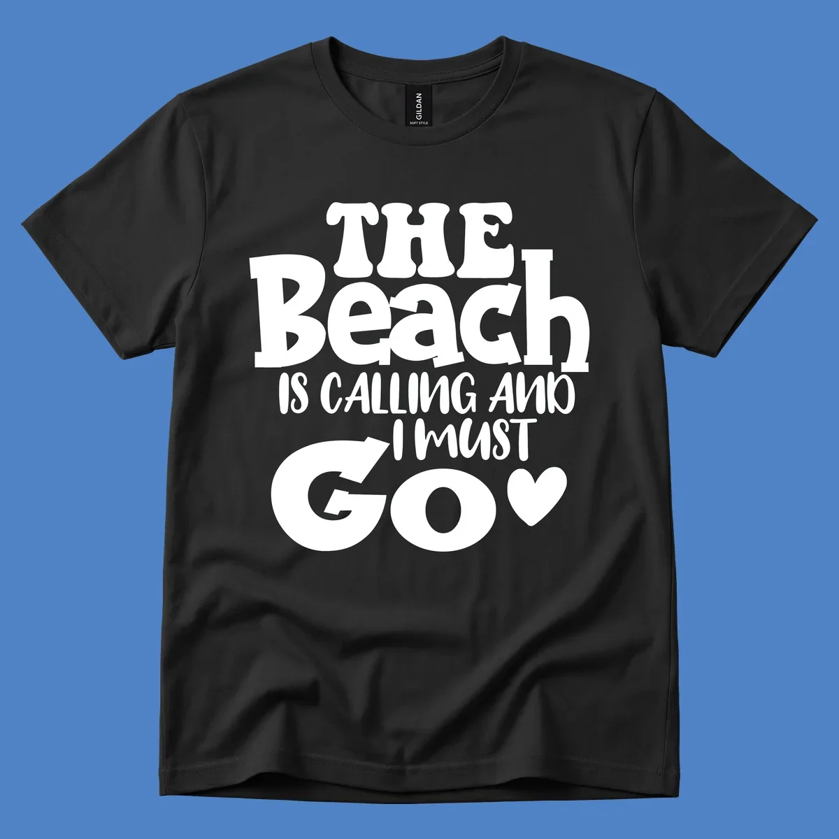 Beach is calling and I must go typography design with heart symbol, white text on gray background