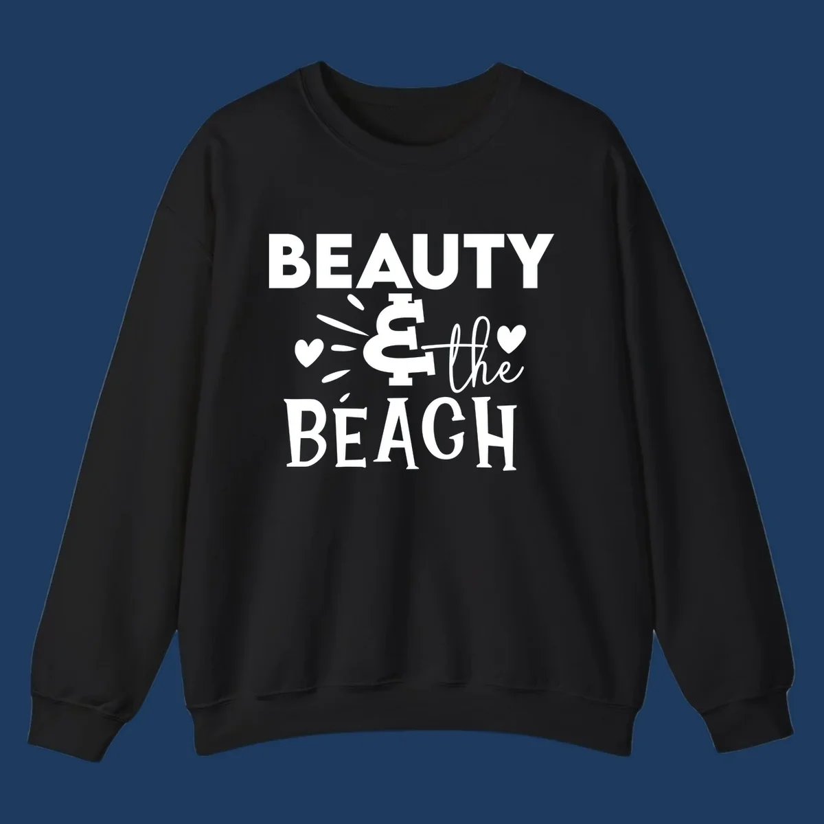 White text design reading 'Beauty & The Beach' with dollar sign symbol and heart decorations on gray background