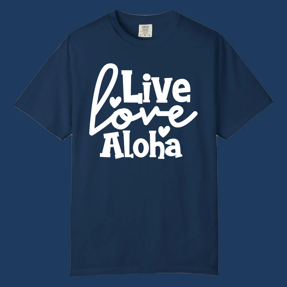 White decorative text reading "Live Love Aloha" with hearts on gray background, island-inspired cruise design