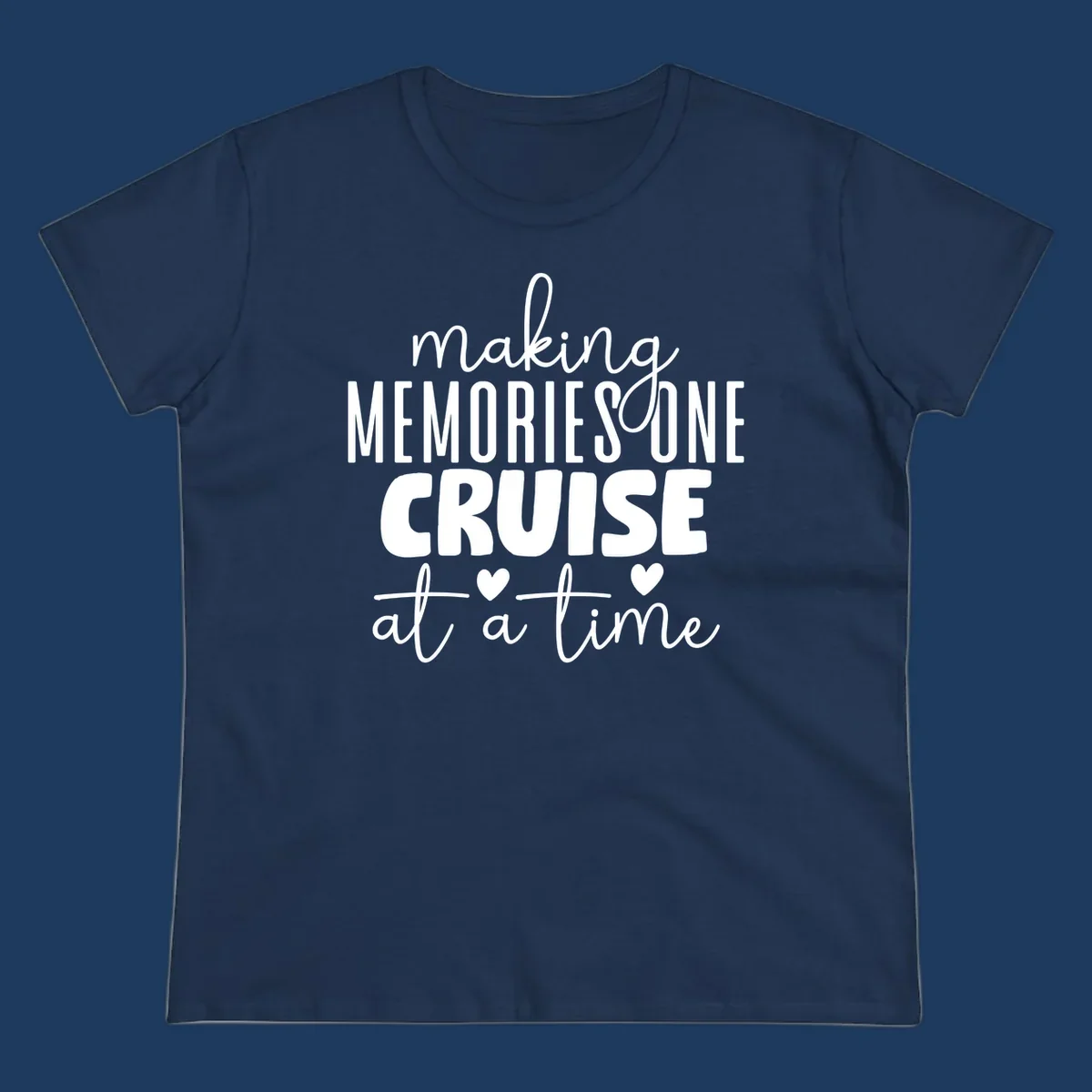White text on gray background reading 'Making Memories One Cruise At A Time' with decorative hearts and flourishes for cruise vacation apparel