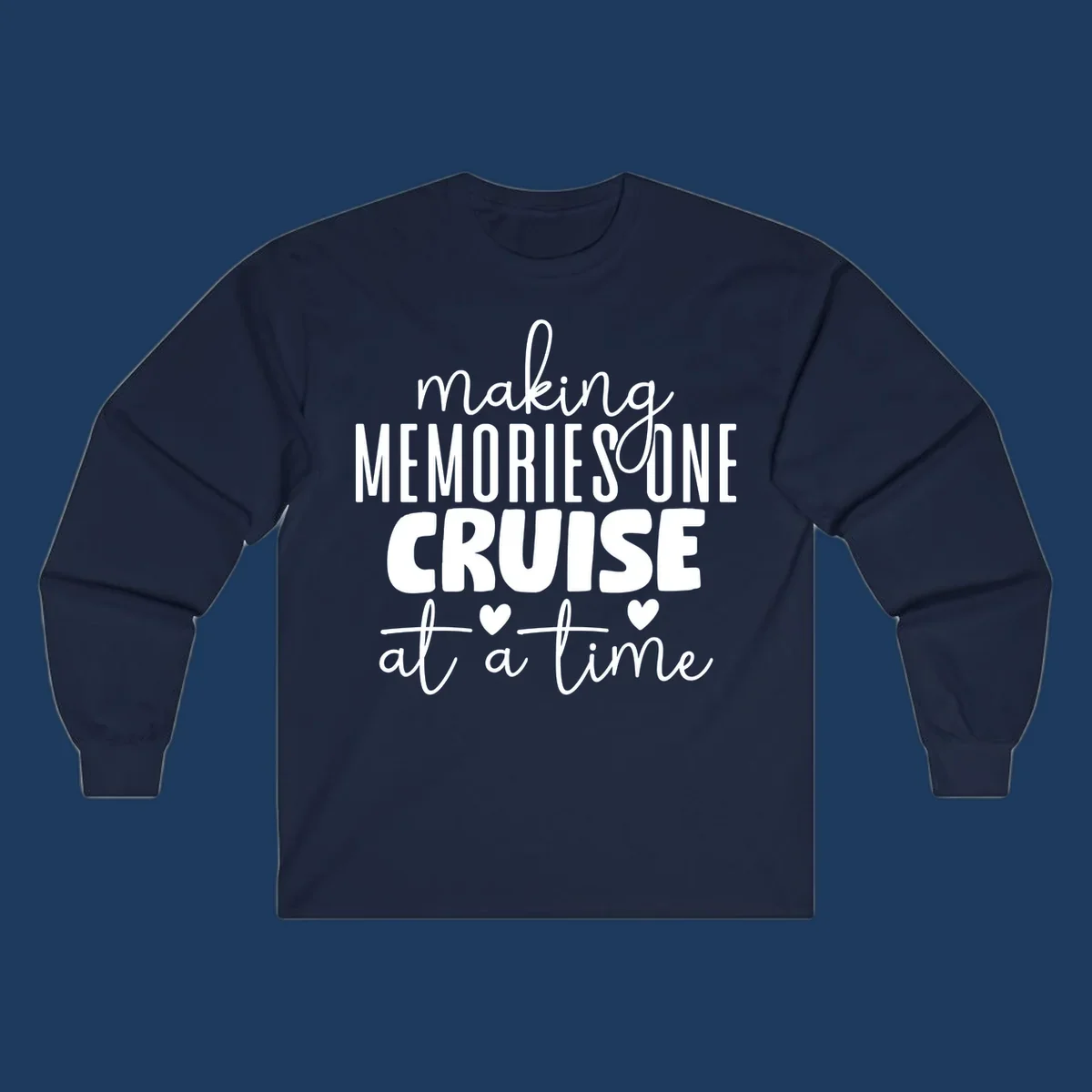 White text on gray background reading 'Making Memories One Cruise At A Time' with decorative hearts and flourishes for cruise vacation apparel