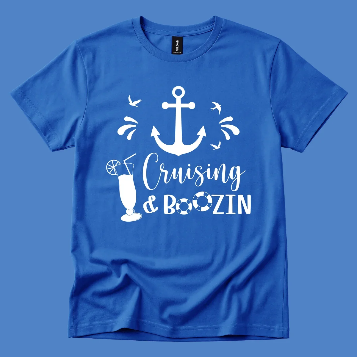 Cruising and boozin anchor design with nautical elements, cocktail, and seabirds on gray background