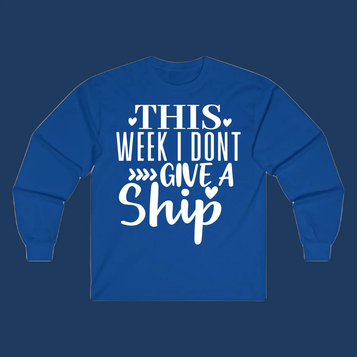 White text on gray background reading 'This Week I Don't Give A Ship' with hearts and arrows, a playful cruise humor design