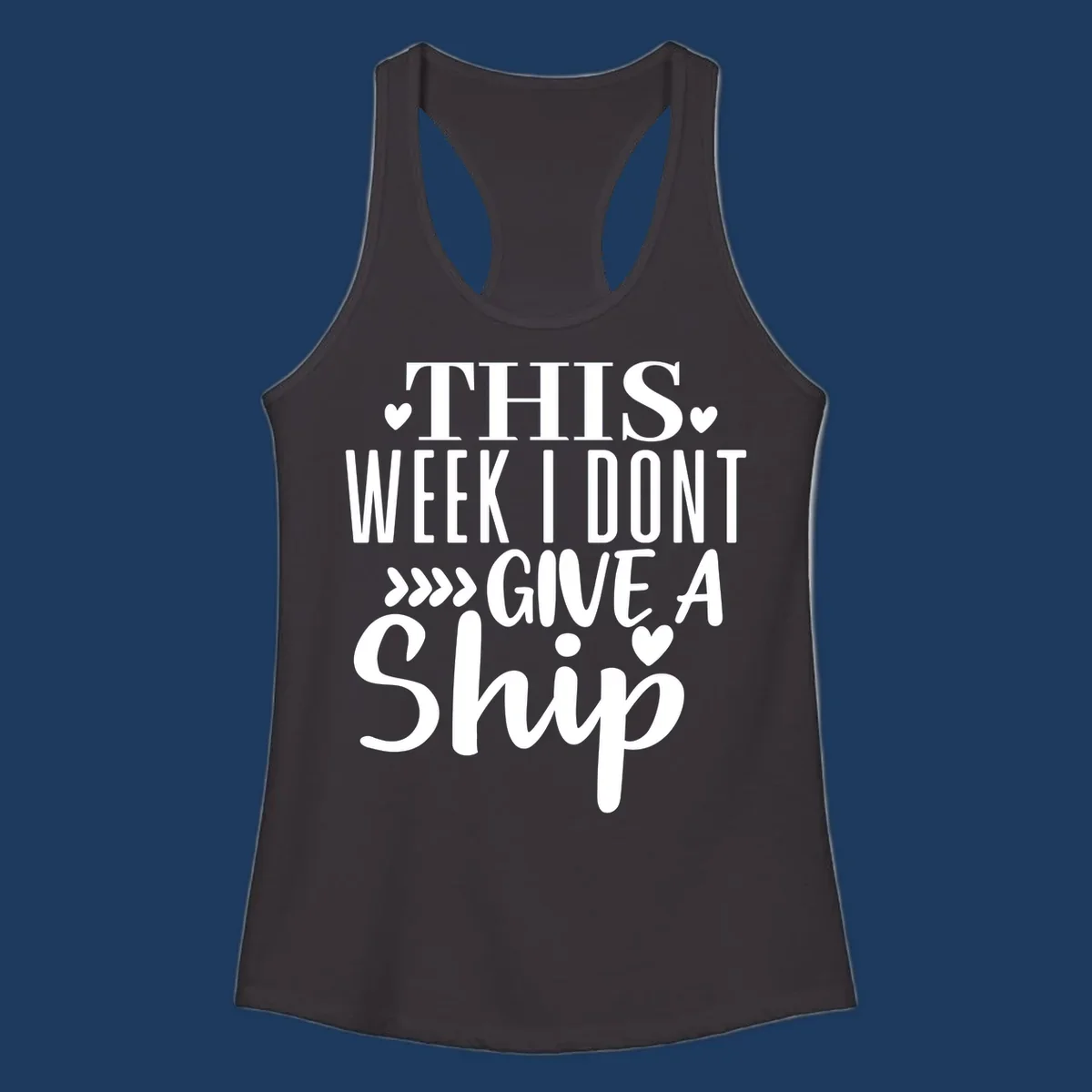 White text on gray background reading 'This Week I Don't Give A Ship' with hearts and arrows, a playful cruise humor design