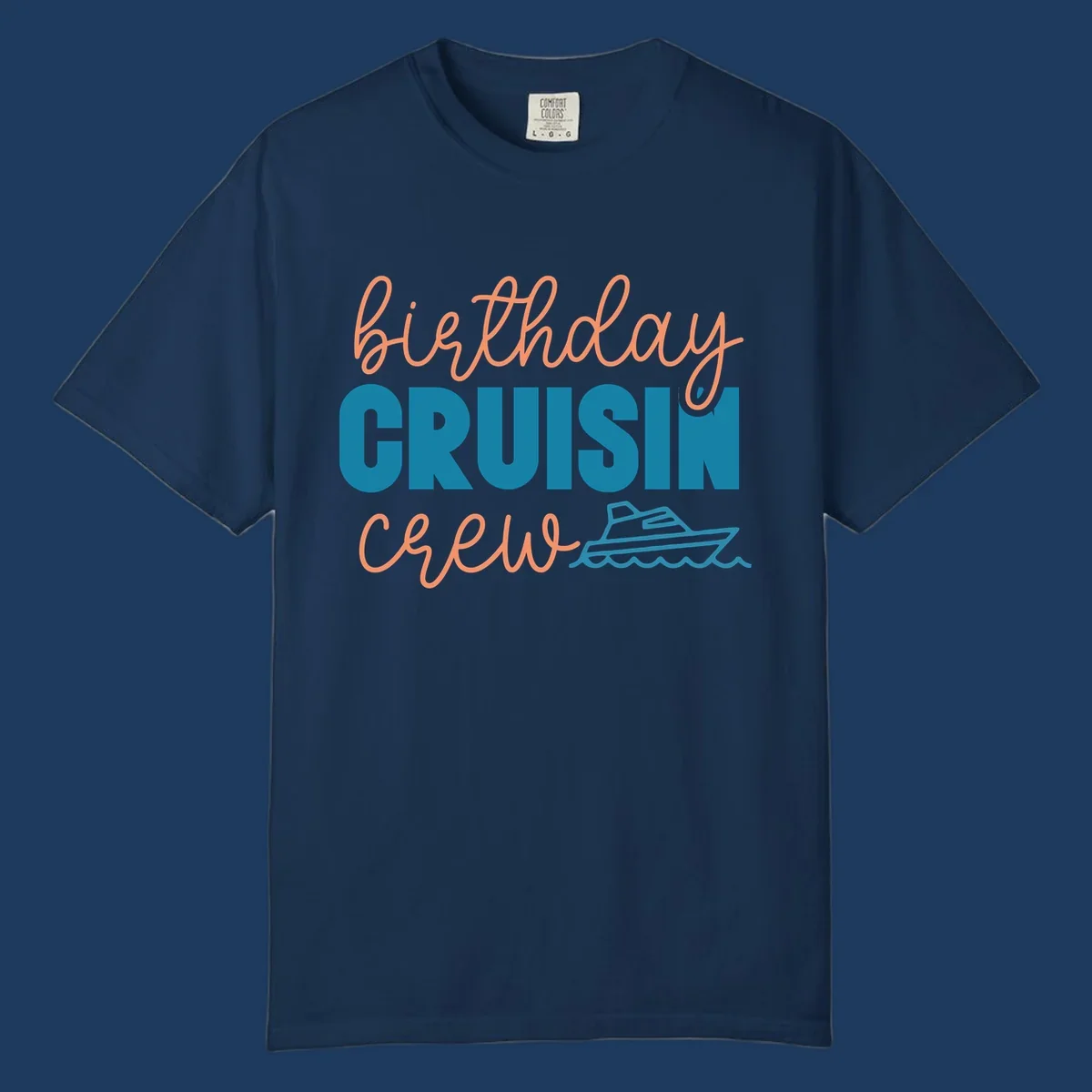 Birthday crushin crew design with coral script text, teal ship illustration, and ocean waves on gray background