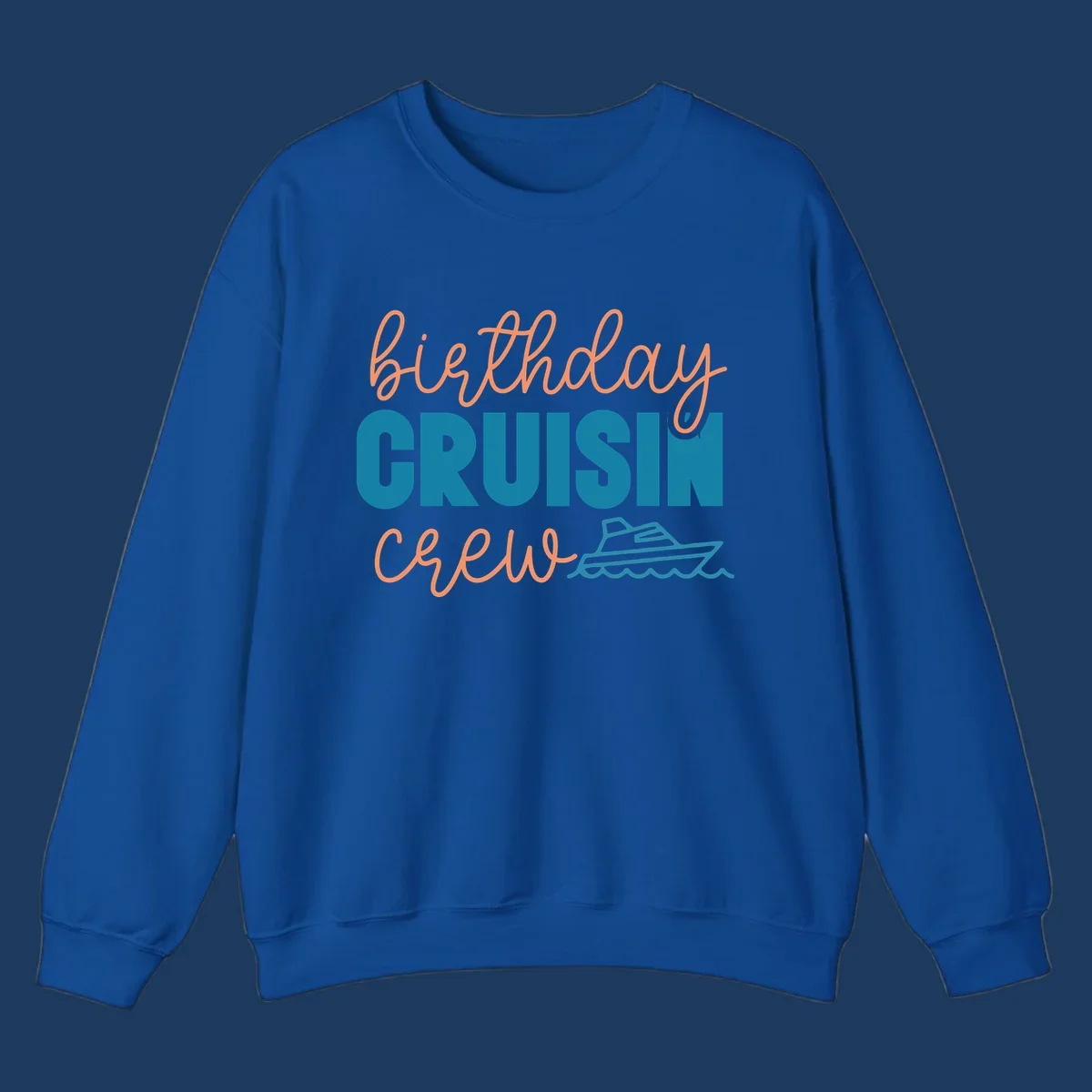 Birthday crushin crew design with coral script text, teal ship illustration, and ocean waves on gray background