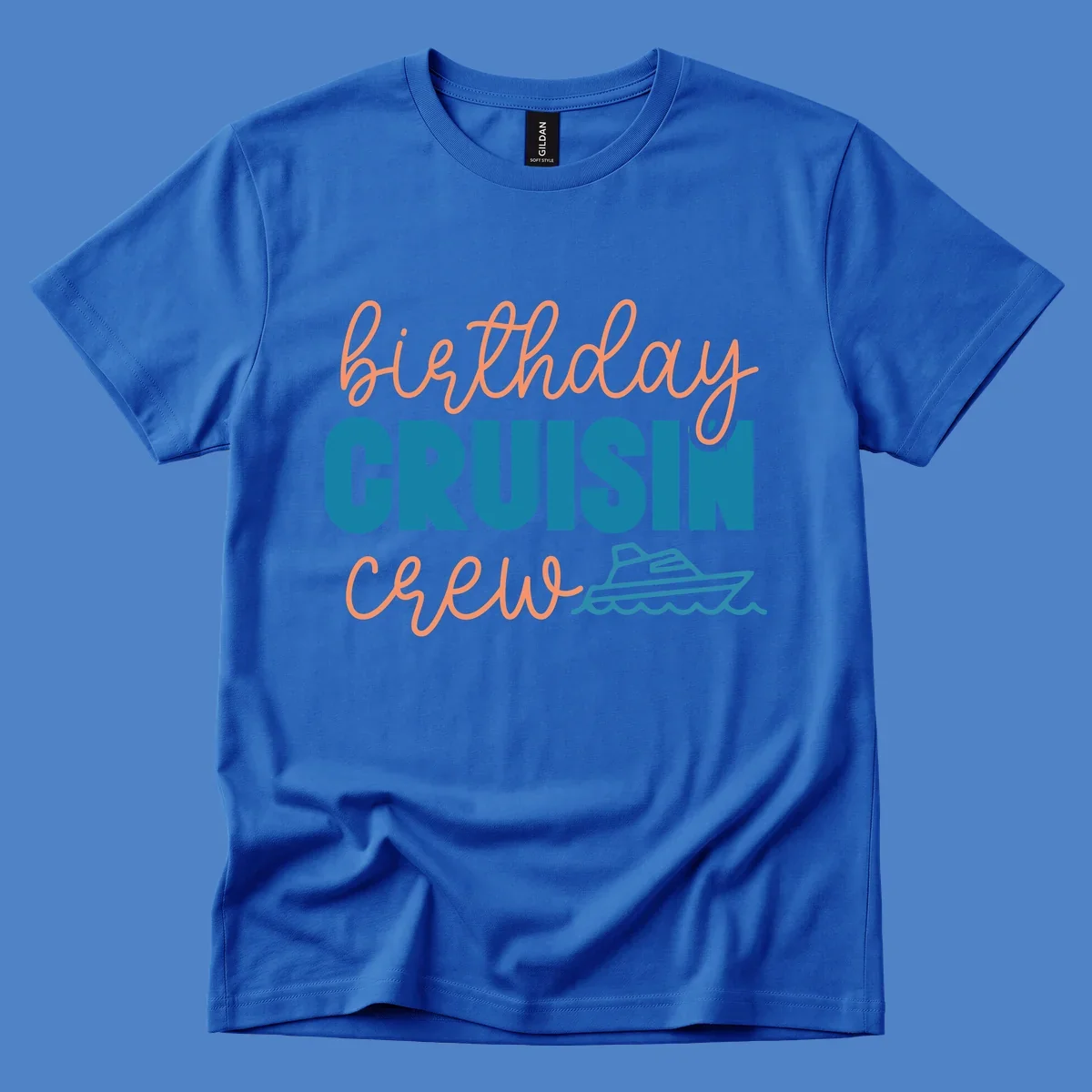 Birthday crushin crew design with coral script text, teal ship illustration, and ocean waves on gray background