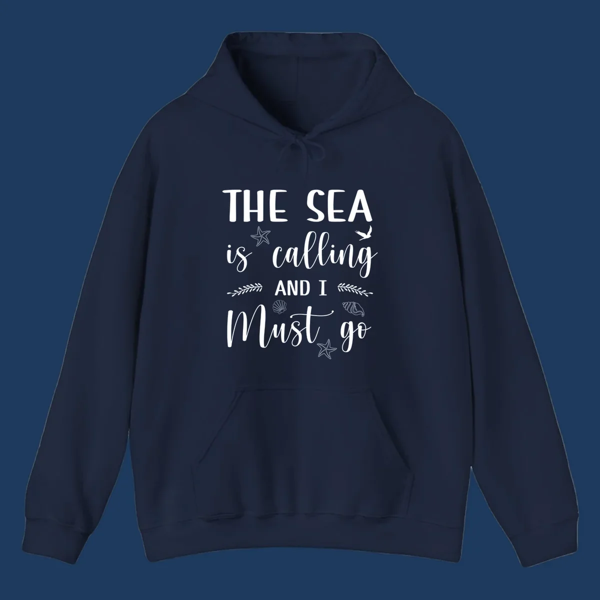 Gray design with white text reading 'The Sea is calling AND I MUST go' surrounded by starfish, seashells, a flying bird, and leaf accents