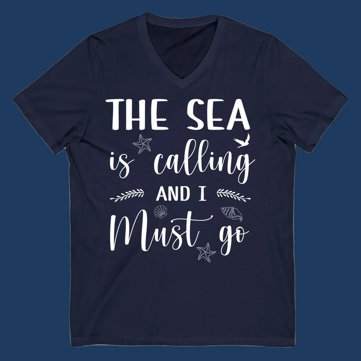 Gray design with white text reading 'The Sea is calling AND I MUST go' surrounded by starfish, seashells, a flying bird, and leaf accents