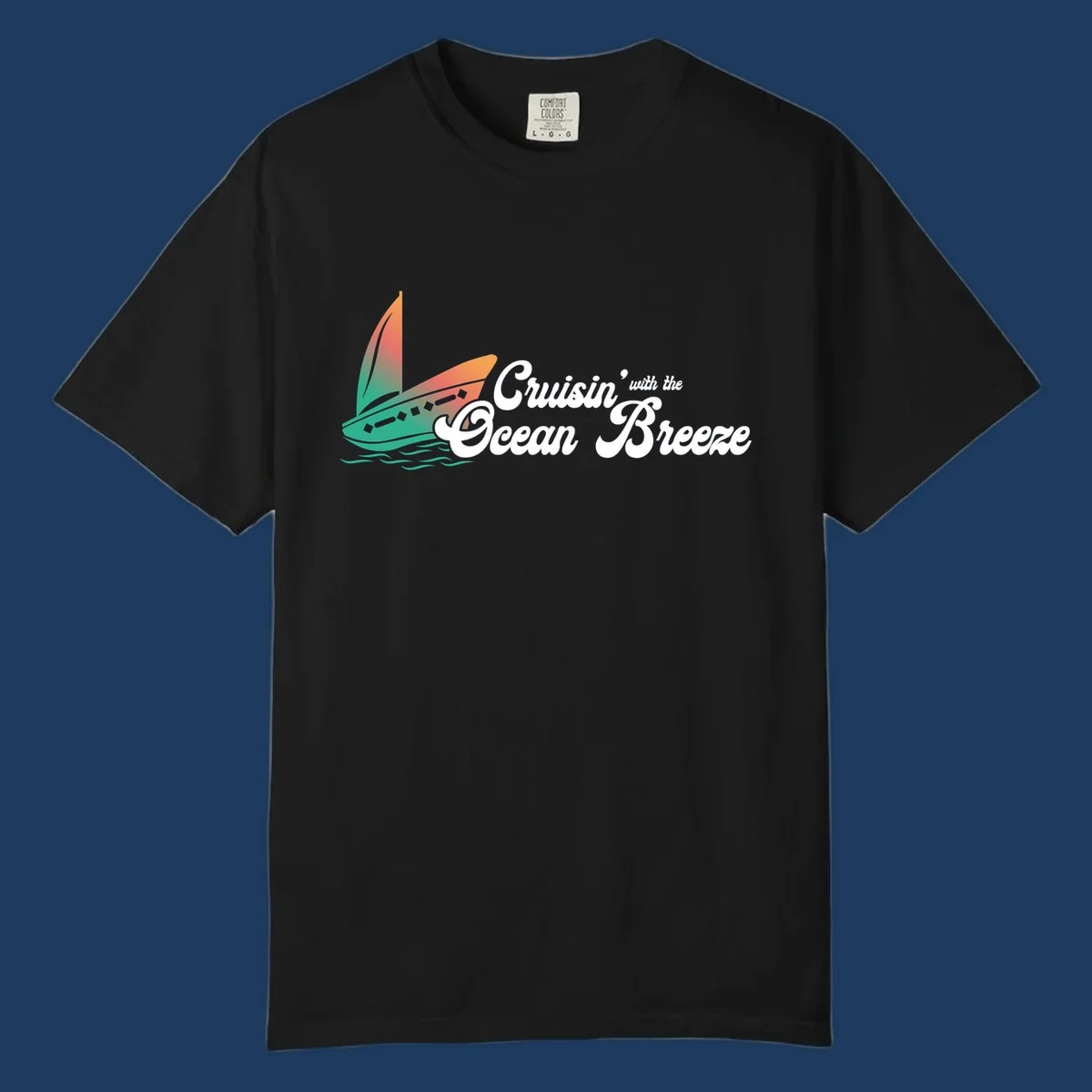 Sailboat with gradient orange-to-green sail on ocean waves with 'Cruisin' with the Ocean Breeze' text in white script