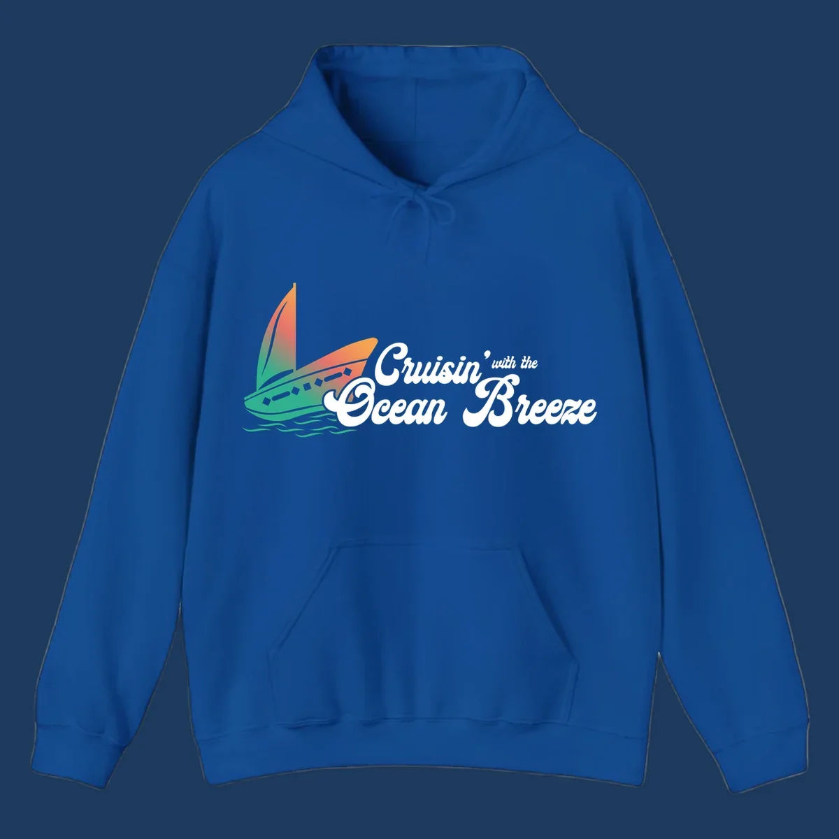 Sailboat with gradient orange-to-green sail on ocean waves with 'Cruisin' with the Ocean Breeze' text in white script
