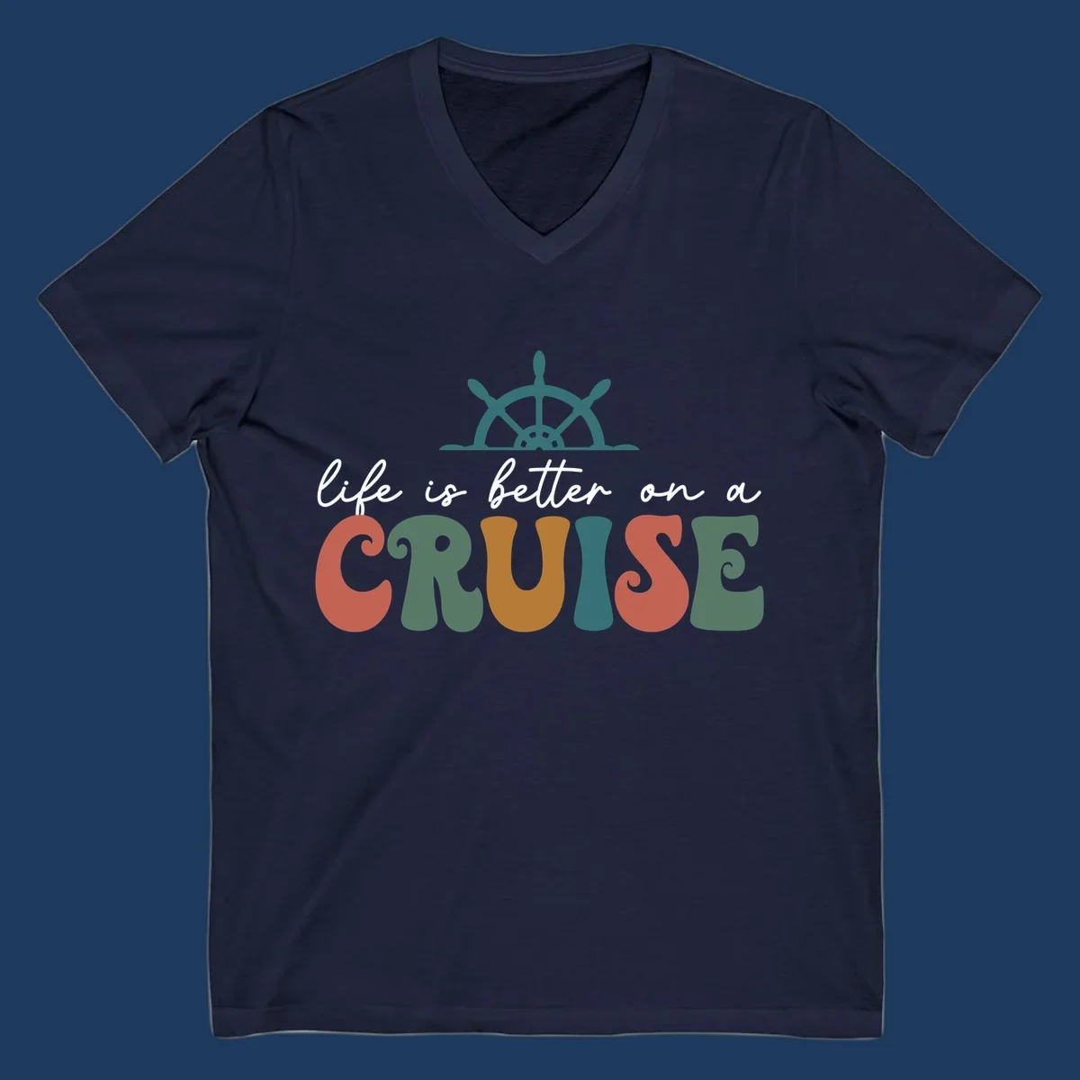 Life is better on a cruise design with ship's wheel and colorful text on gray background