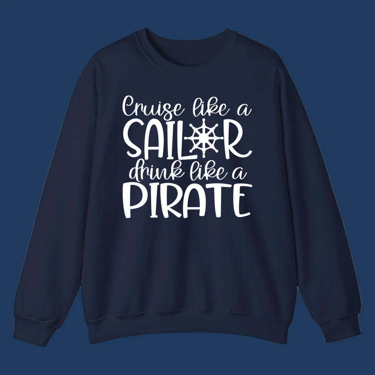 White text design with ship wheel graphic reading 'Cruise like a SAILOR drink like a PIRATE' on gray background