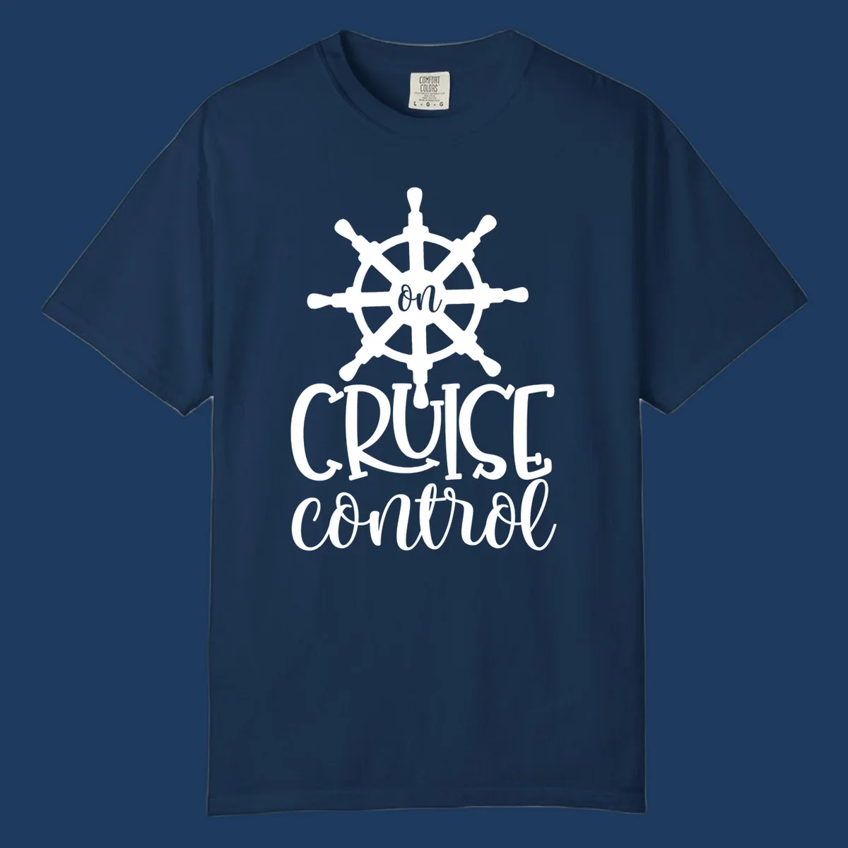 White ship wheel with 'ON CRUISE CONTROL' text below on gray background - nautical cruise design