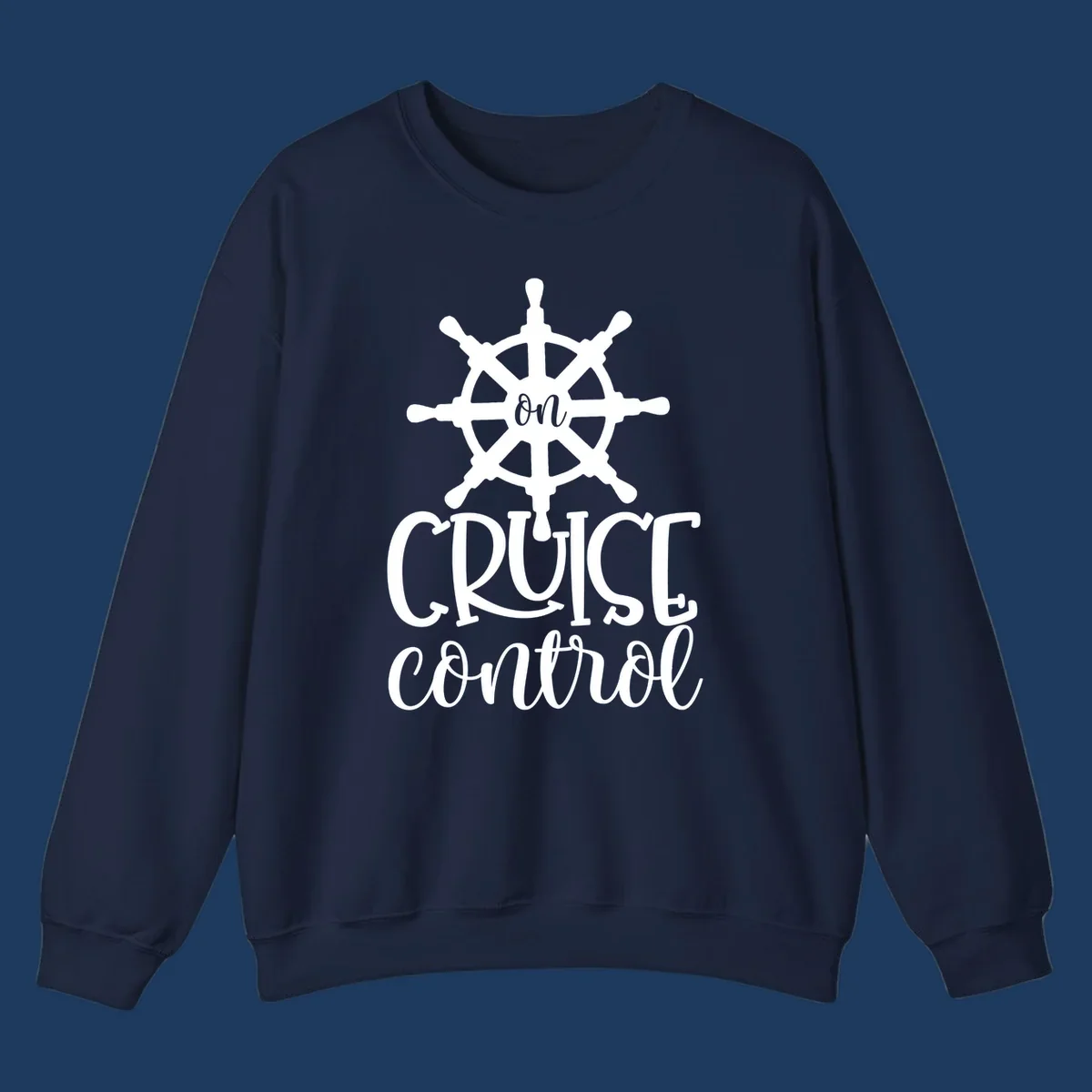 White ship wheel with 'ON CRUISE CONTROL' text below on gray background - nautical cruise design
