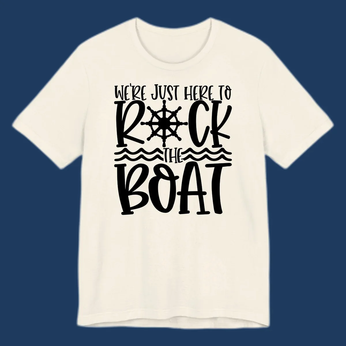 White nautical design with ship's wheel and ocean waves featuring text 'We're Just Here To Kick The Boat' on gray background
