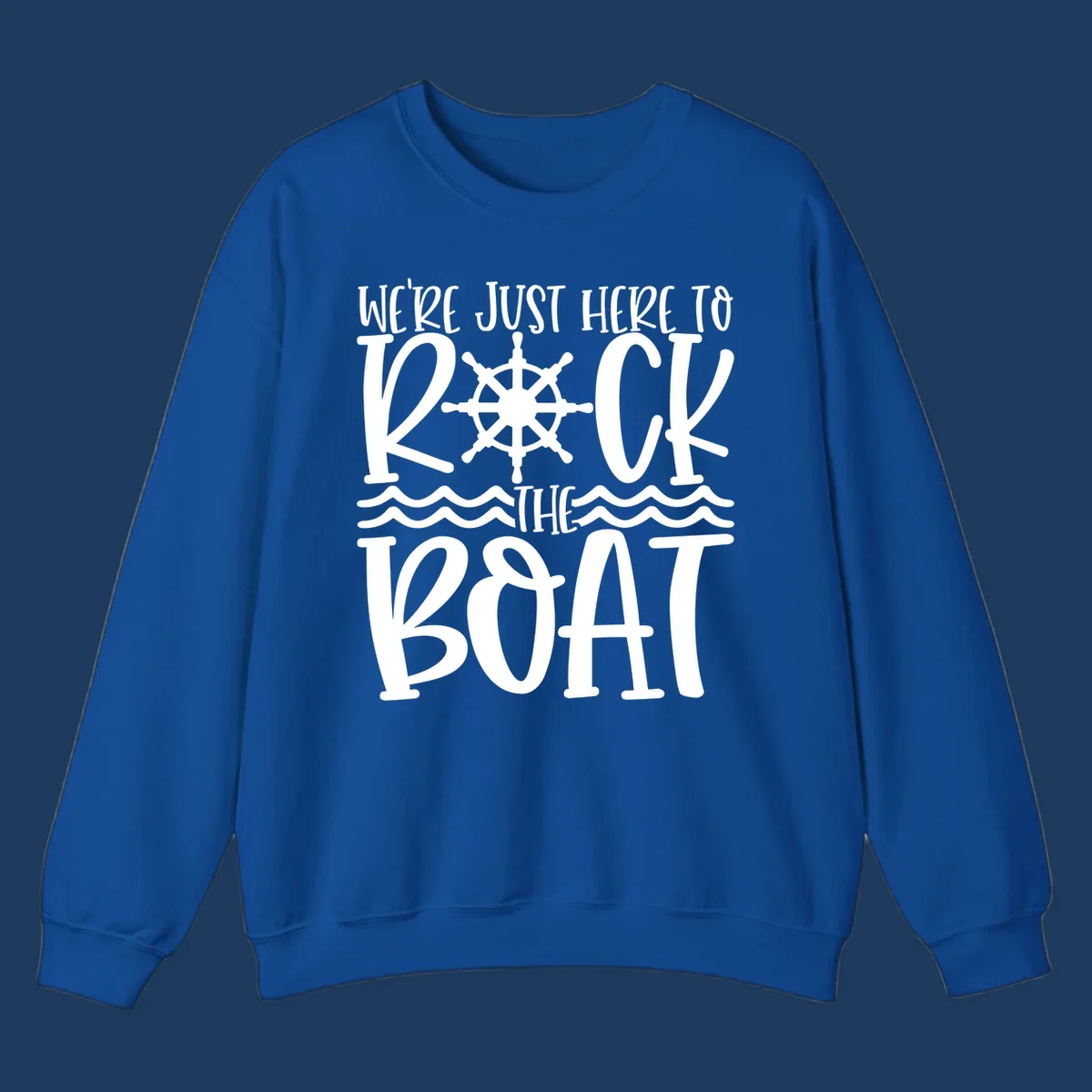 White nautical design with ship's wheel and ocean waves featuring text 'We're Just Here To Kick The Boat' on gray background