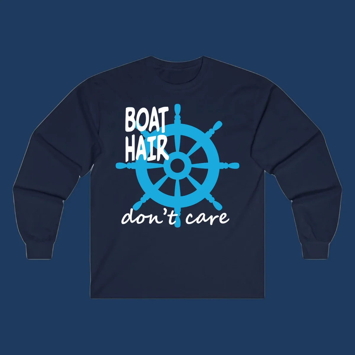 Blue ship's wheel graphic with white text reading 'BOAT HAIR don't care' - nautical cruise humor design