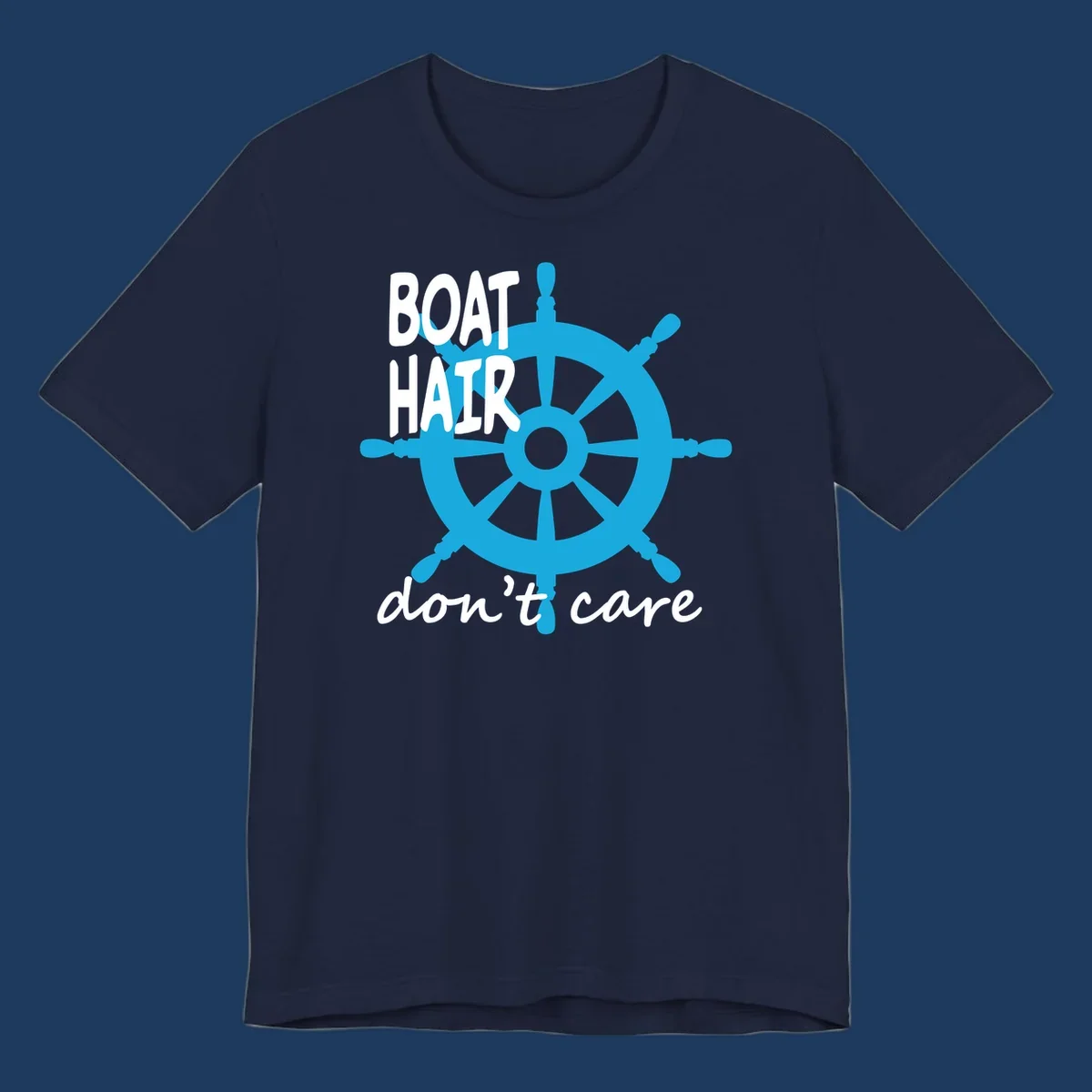 Blue ship's wheel graphic with white text reading 'BOAT HAIR don't care' - nautical cruise humor design