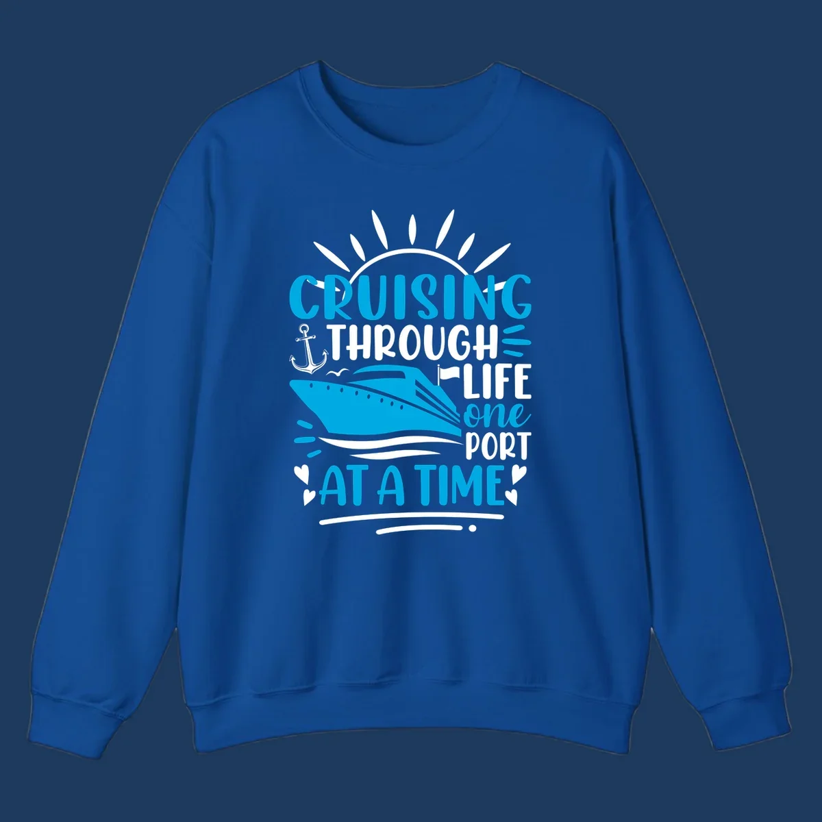 Blue cruise ship with sun rays and ocean waves, text reading 'Cruising Through Life One Port At A Time' with nautical anchor and heart decorations