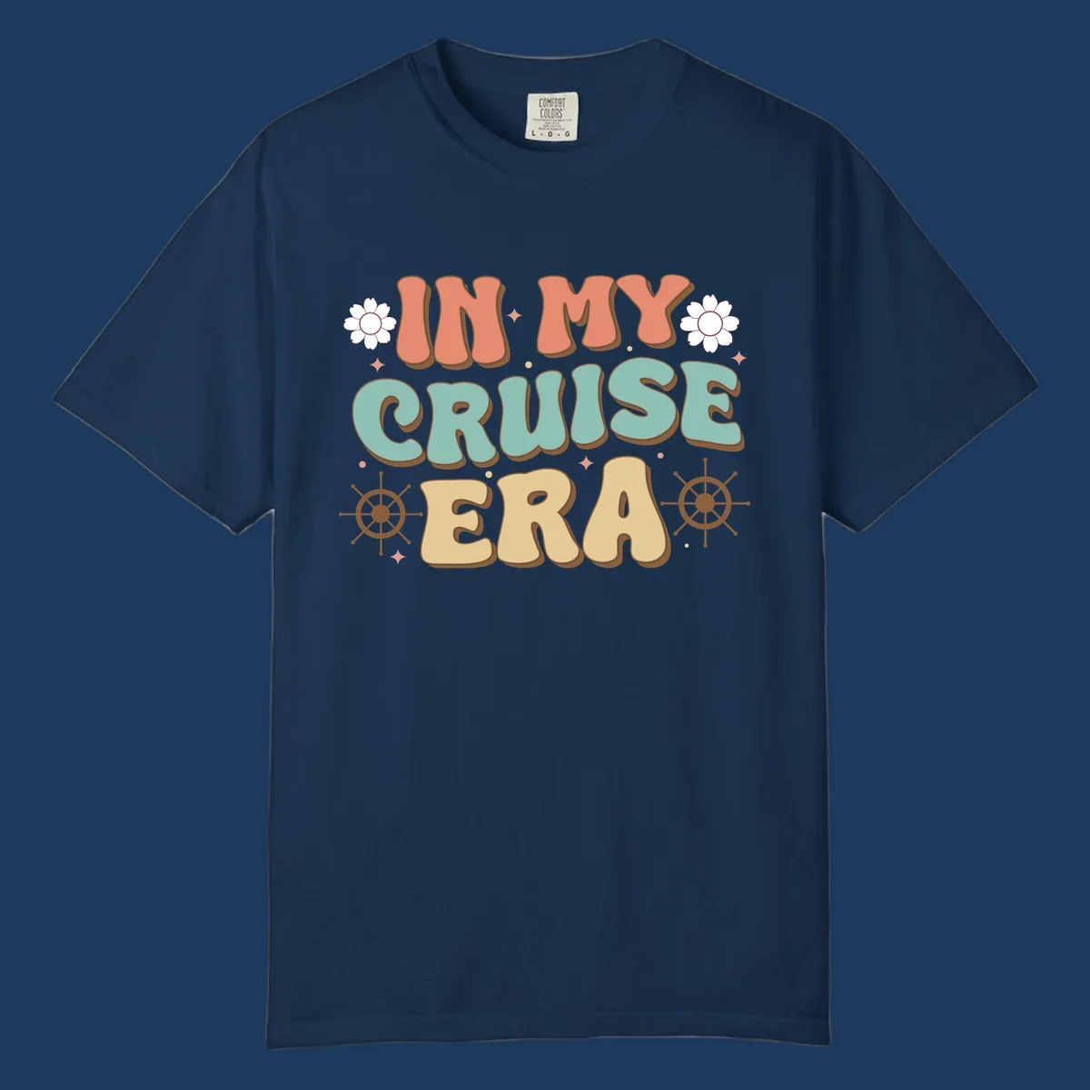 Retro-style design reading 'In My Cruise Era' with nautical ship wheels, daisies, and sparkles on gray background