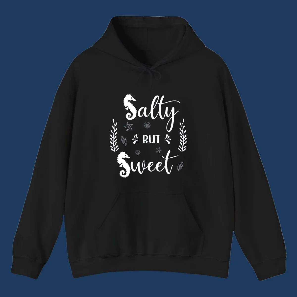 Salty but sweet nautical design with seahorses, starfish, and seashells in white on gray background