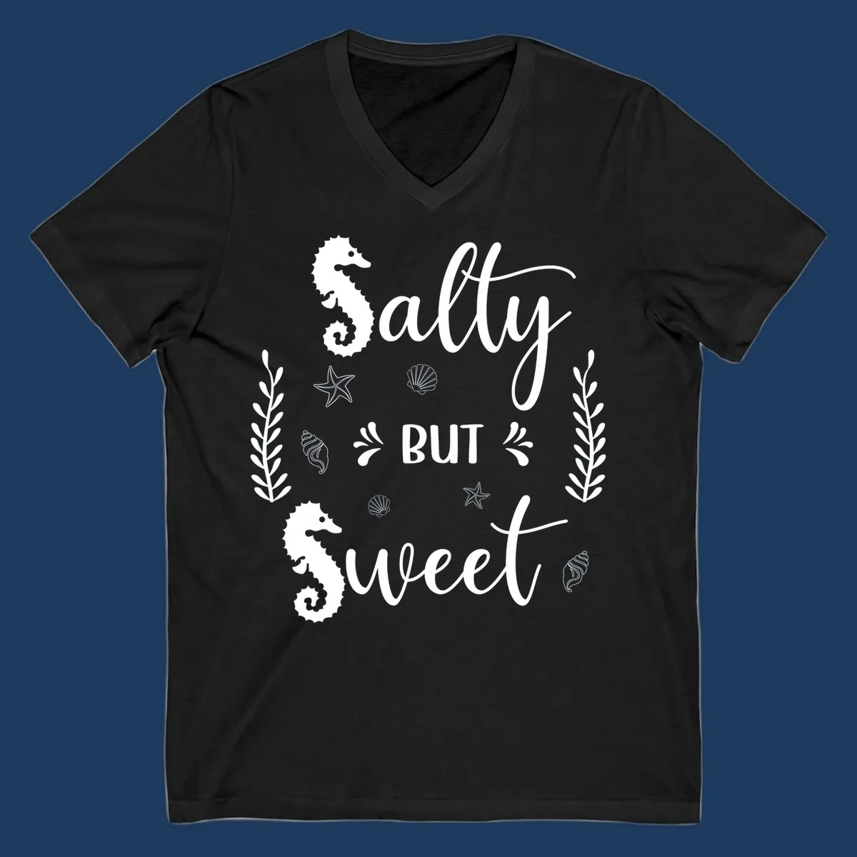 Salty but sweet nautical design with seahorses, starfish, and seashells in white on gray background