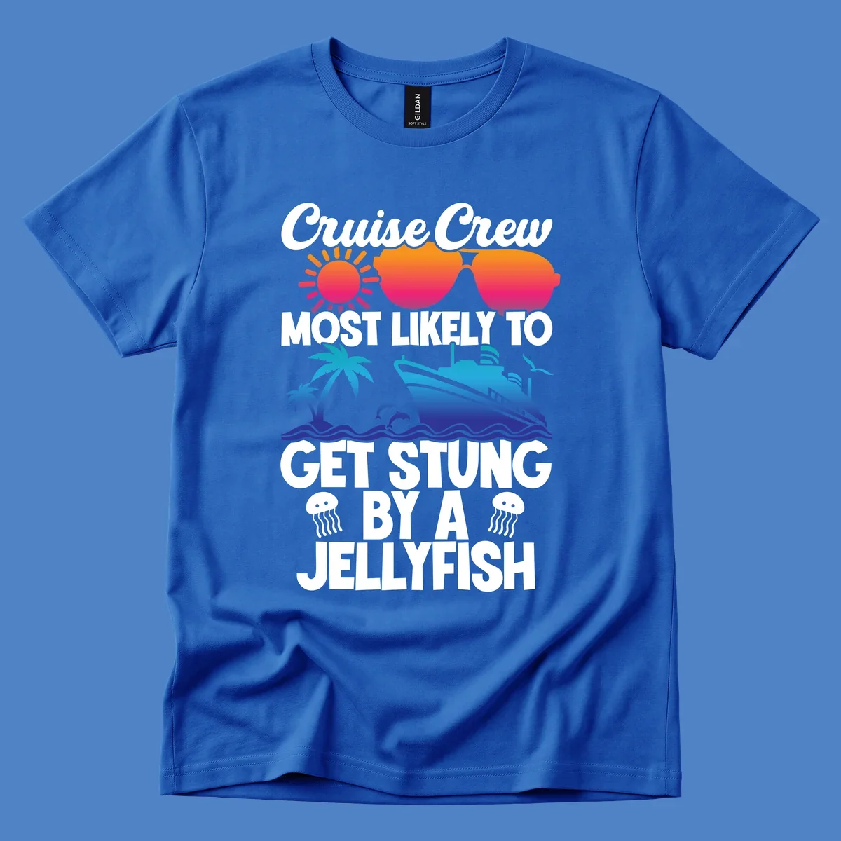 Colorful cruise design with sun, ship, dolphins, and jellyfish. Text reads 'Cruise Crew Most Likely To Get Stung By A Jellyfish'